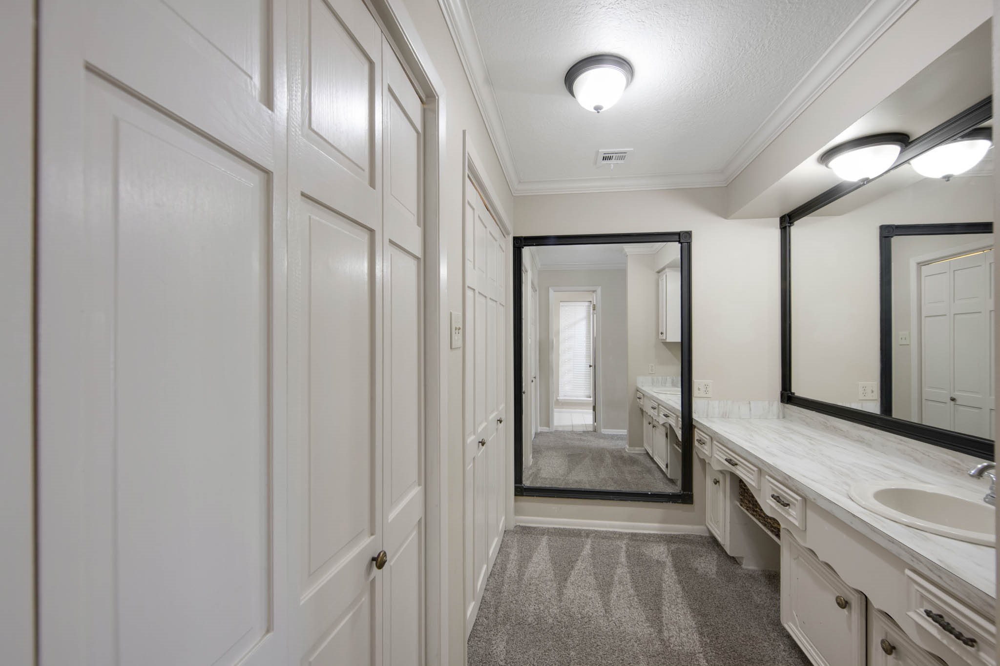View of vanity and closet
