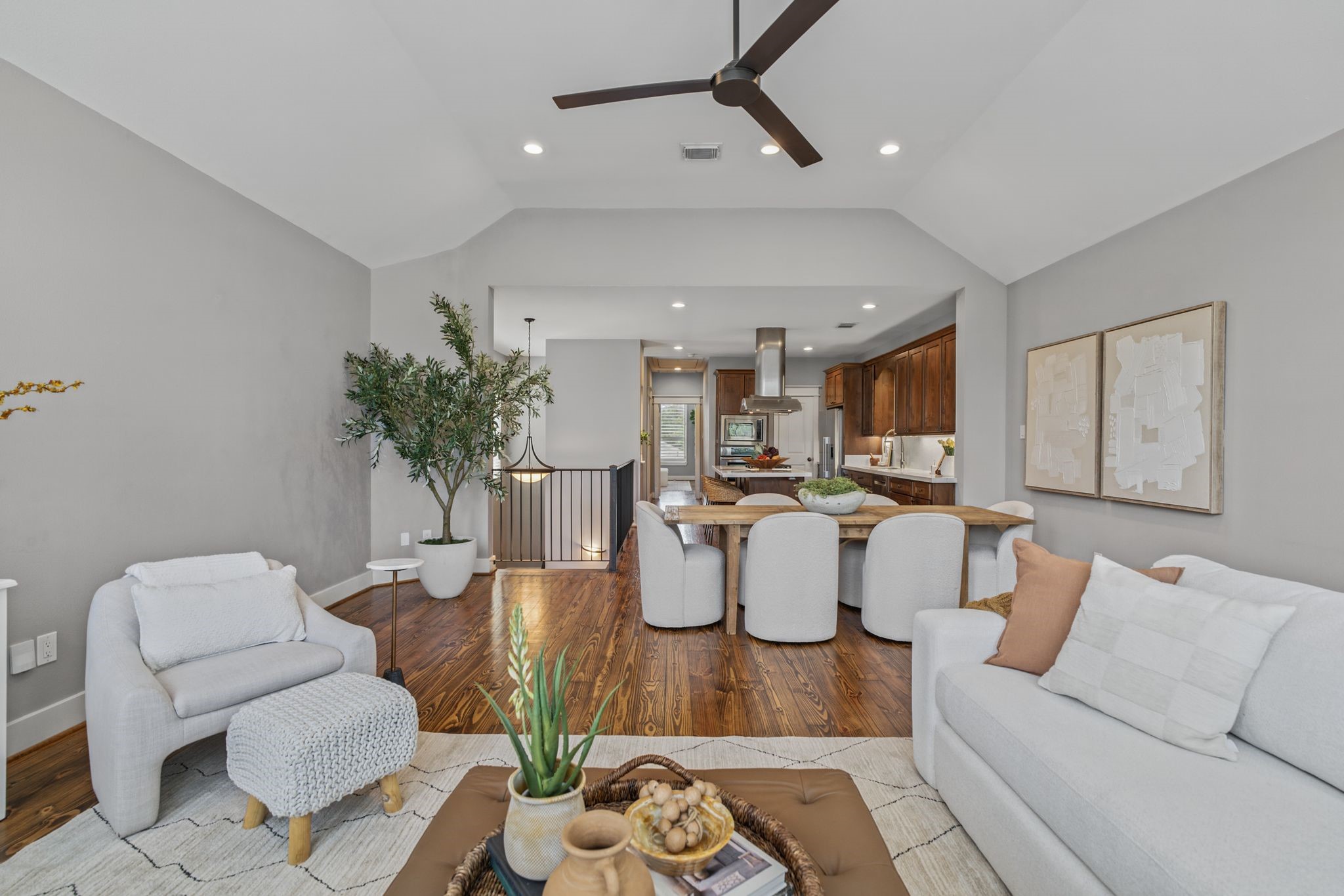 An open layout creates a seamless flow between the living, dining, and kitchen areas.
