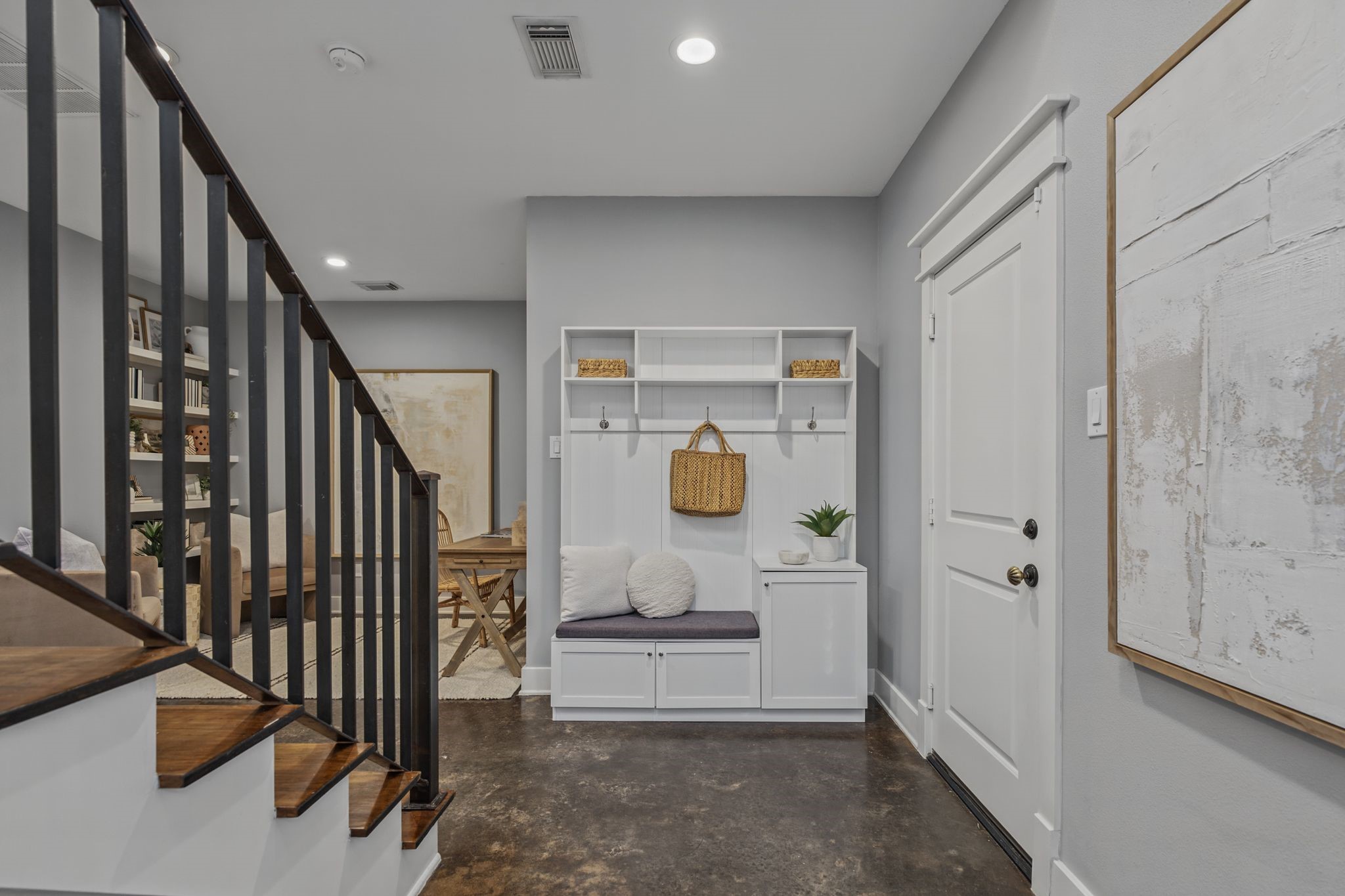 Upon entry you're greeted by polished concrete floors that anchor a versatile first-level layout. Upon entry you're greeted by polished concrete floors that anchor a versatile first-level layout.
