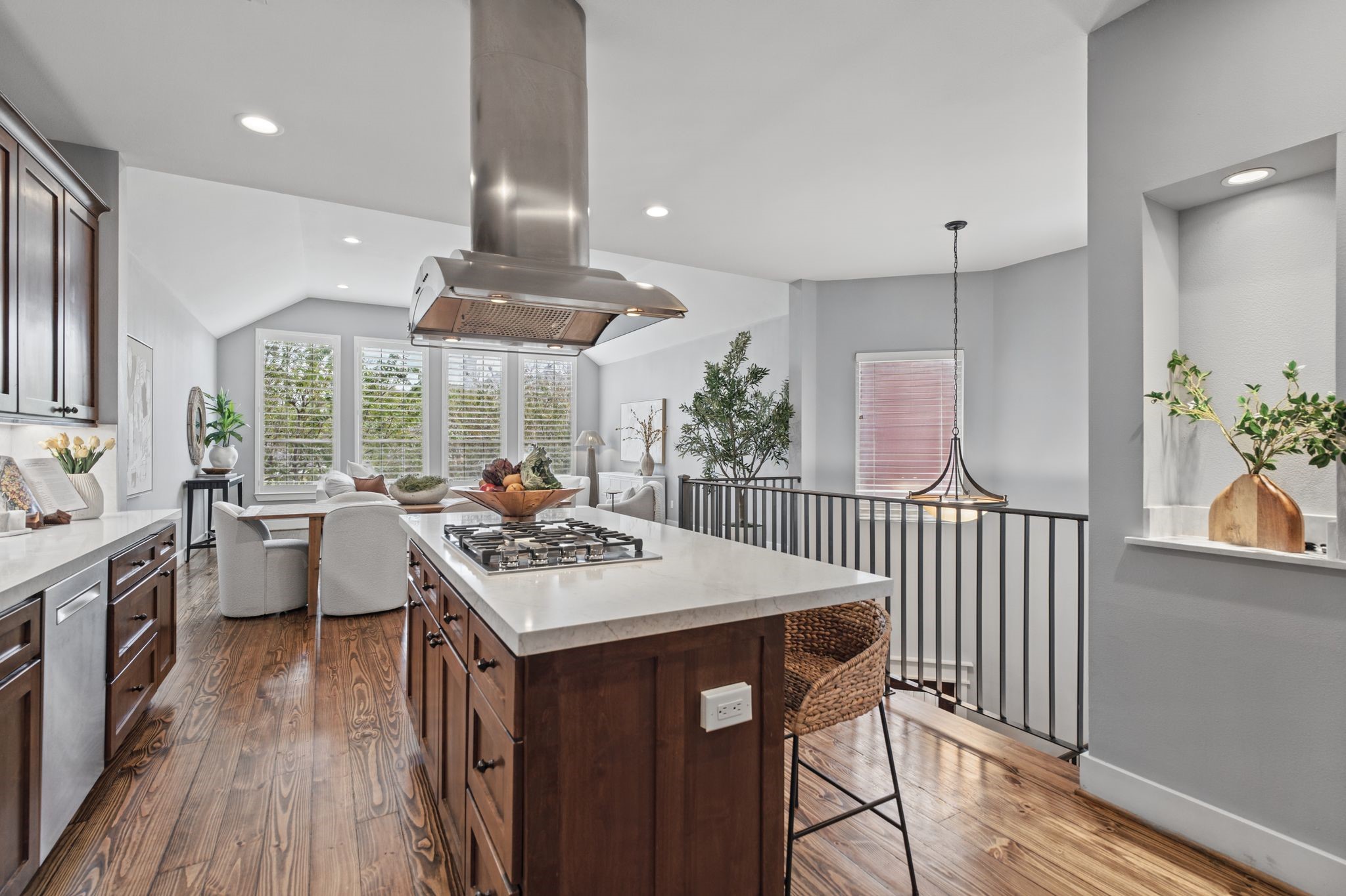 Another perspective from the kitchen highlights the seamless connection to the dining and living areas.