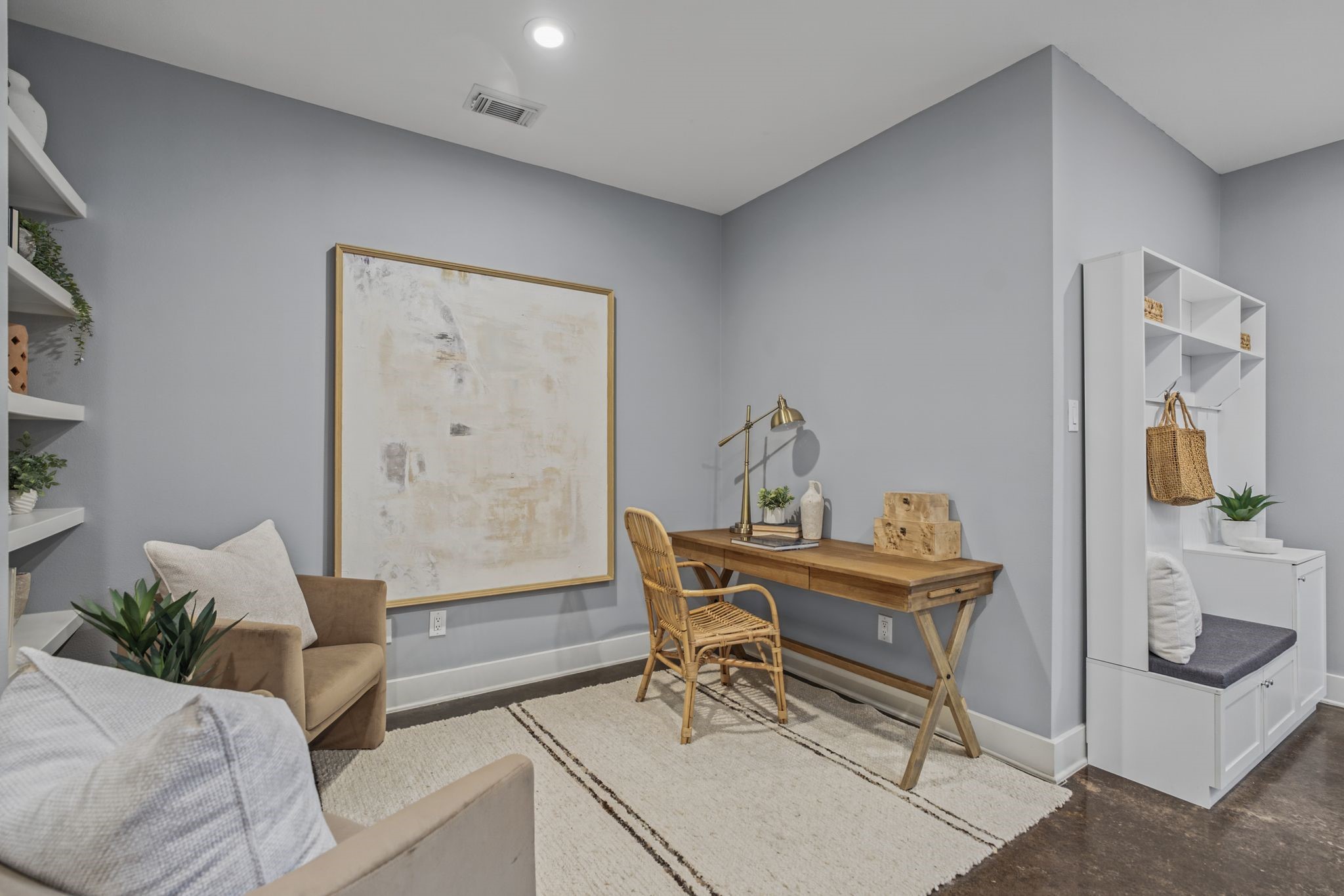The first level features two bedrooms, a beautifully renovated full bathroom, and a flexible space ideal for a home office or study. The first level features two bedrooms, a beautifully renovated full bathroom, and a flexible space ideal for a home office or study.