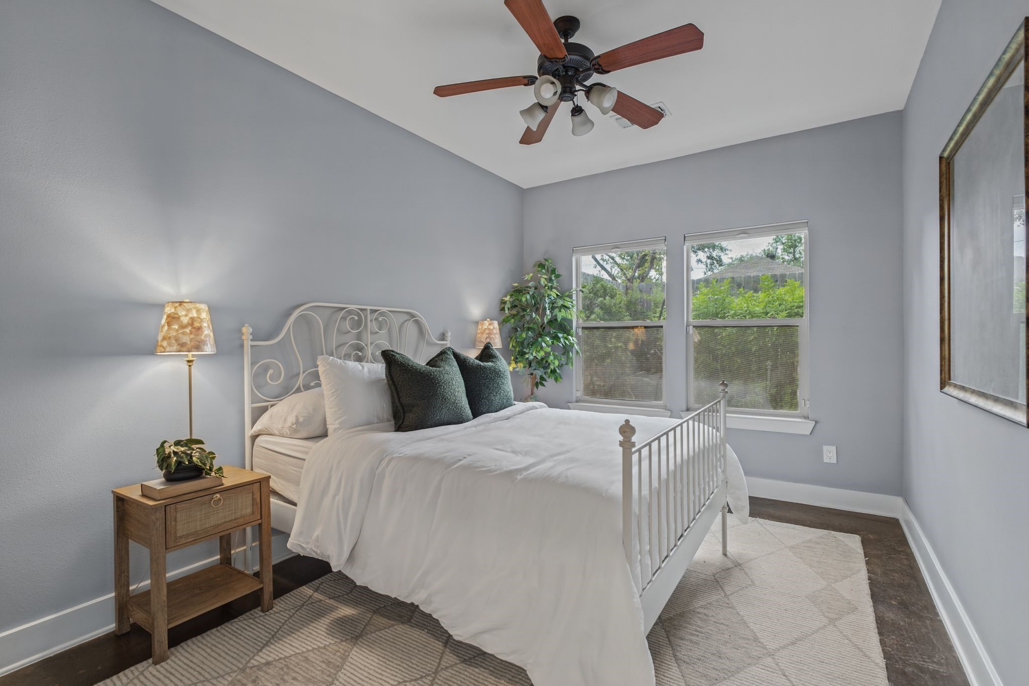 The second bedroom on the first floor enjoys abundant natural light and views of the backyard. The second bedroom on the first floor enjoys abundant natural light and views of the backyard.