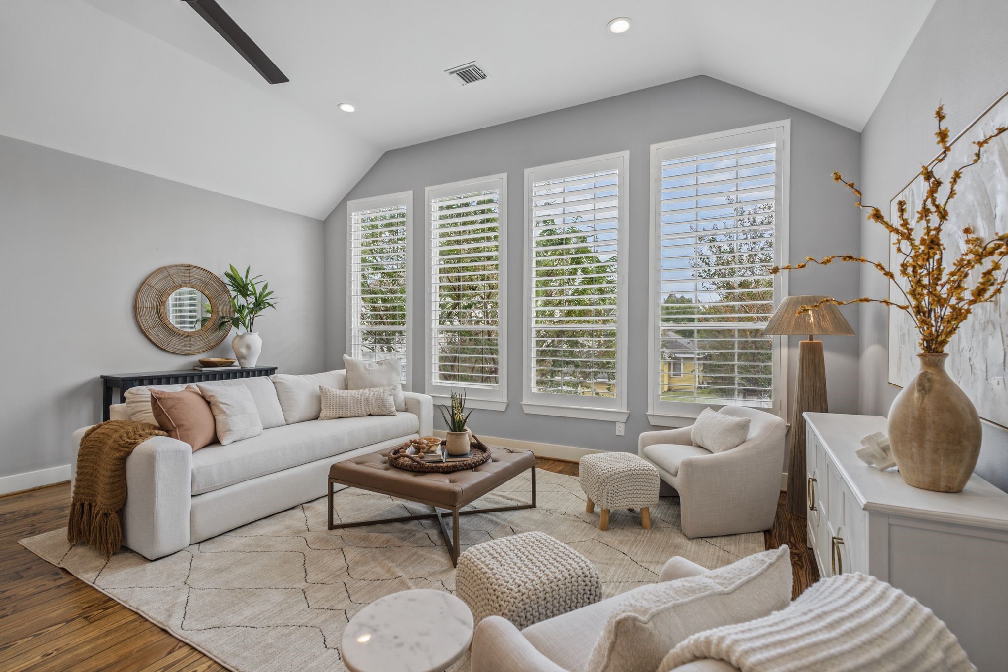 Recently refinished pine floors bring warmth and character to the open living space.