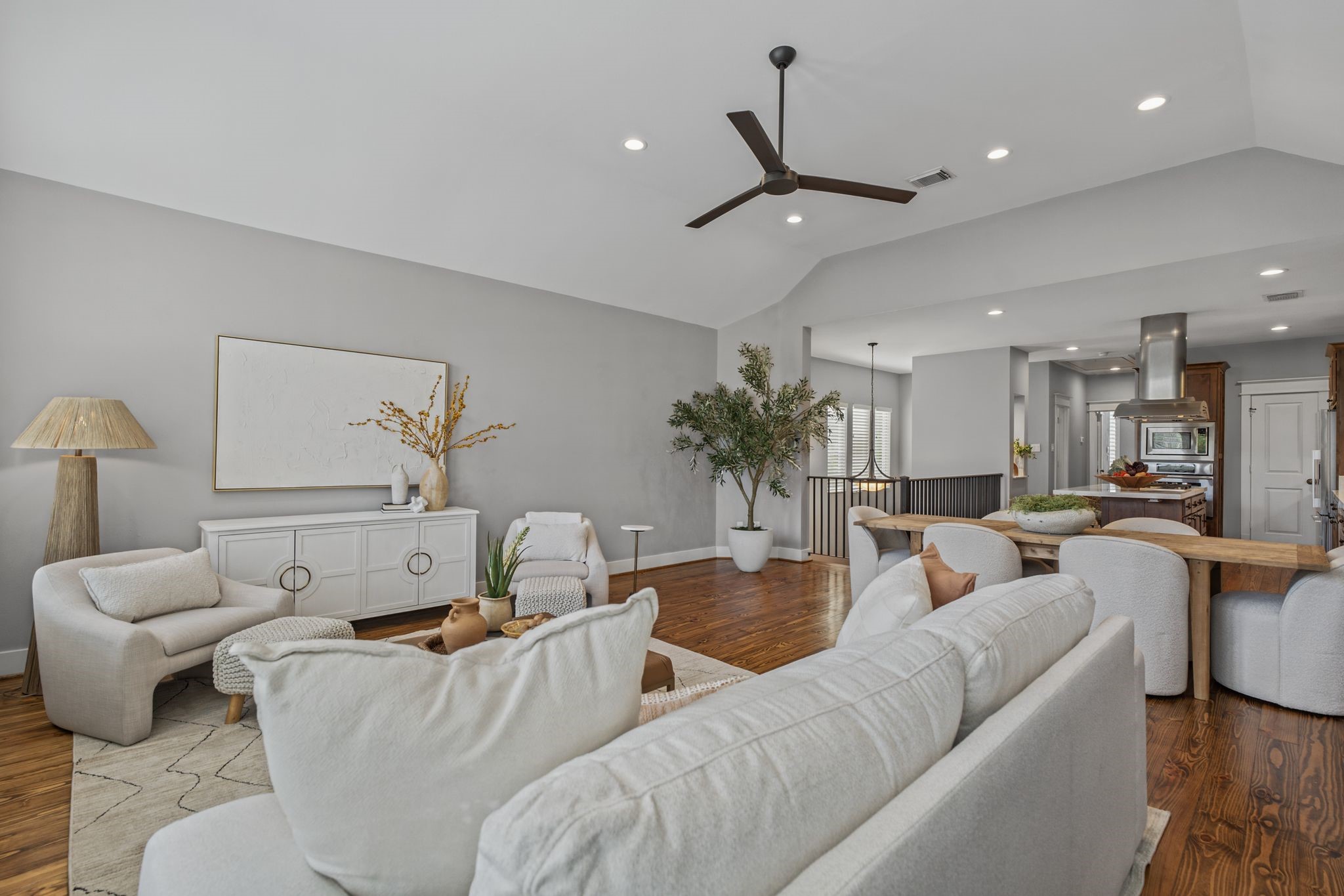 Abundant natural light highlights the beautiful pine floors and spacious layout, ideal for everyday living and entertaining.