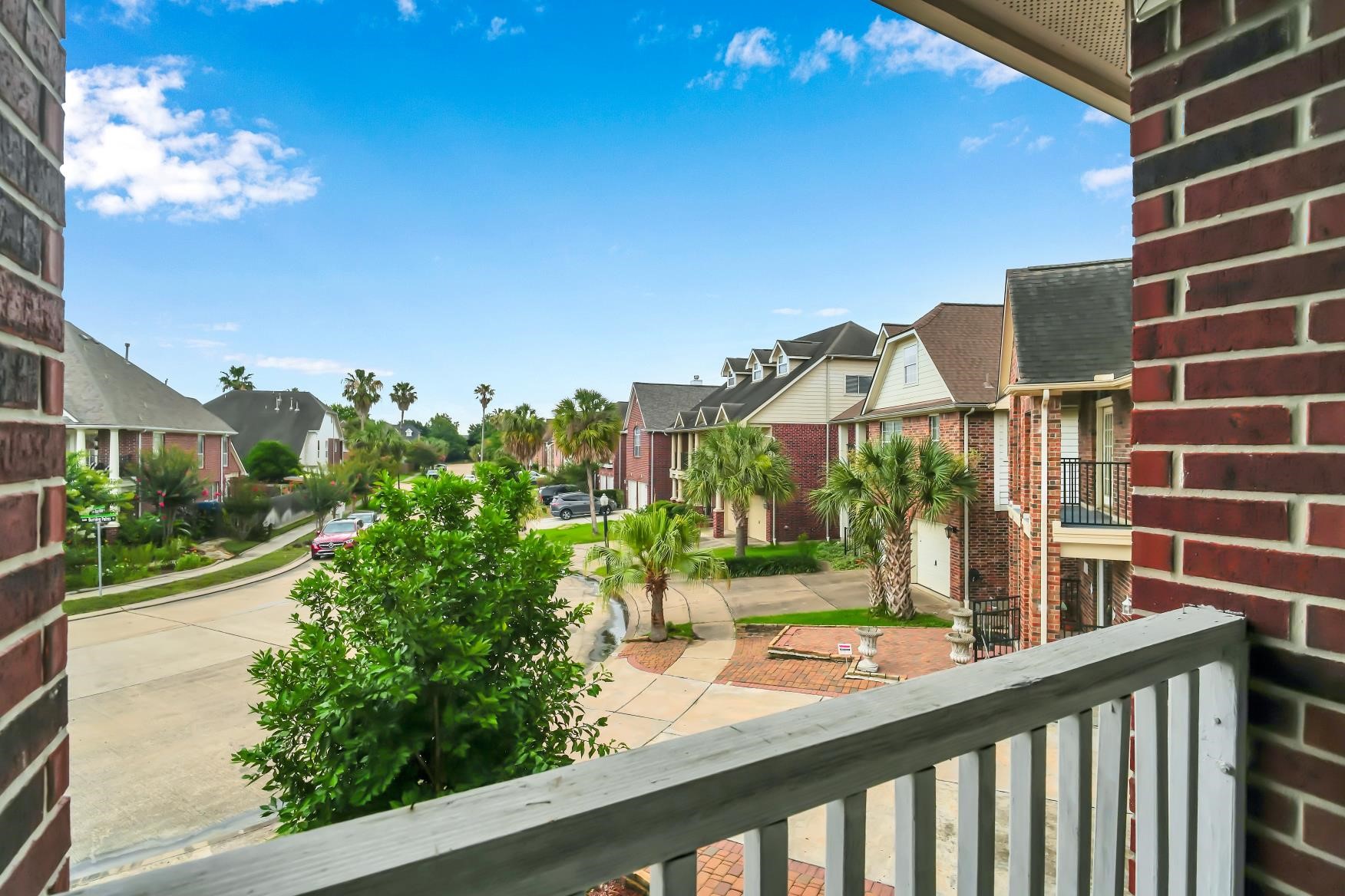 Relax on your private balcony with stunning neighborhhod views.
