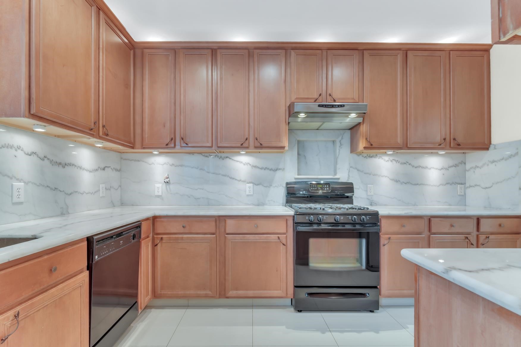 Spacious 14x9 Kitchen featuring elegant tile flooring and stylish under cabinates lighting
