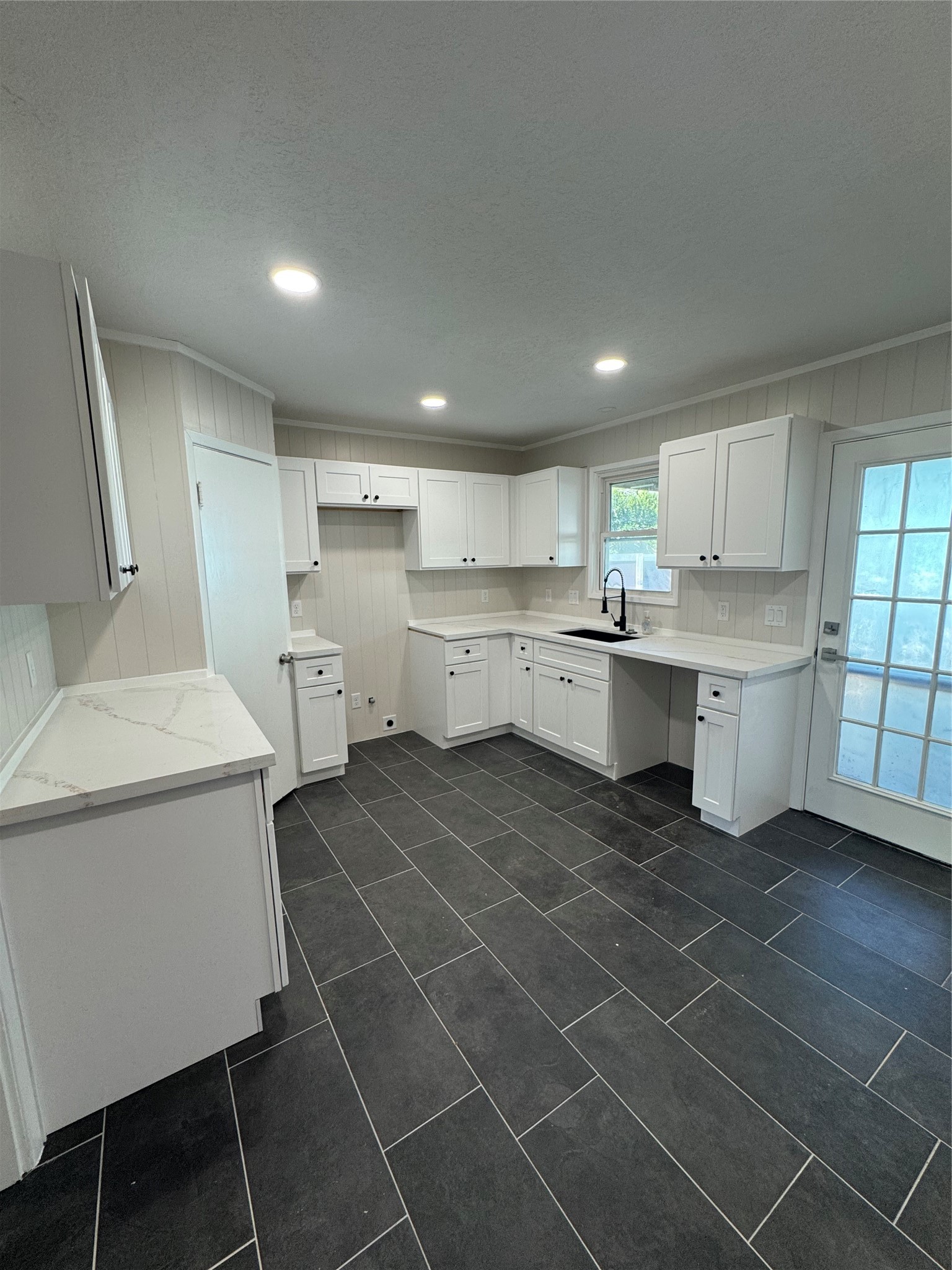 New kitchen has full size pantry.