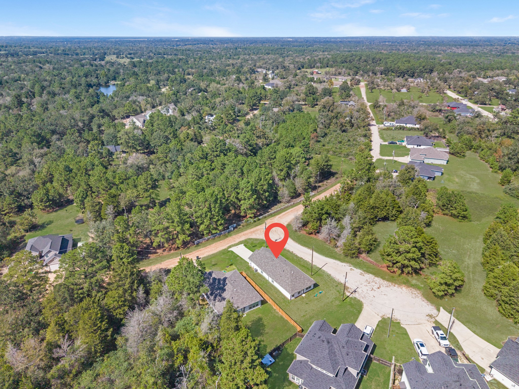 Nestled in nature, this private new construction residence is move in ready!