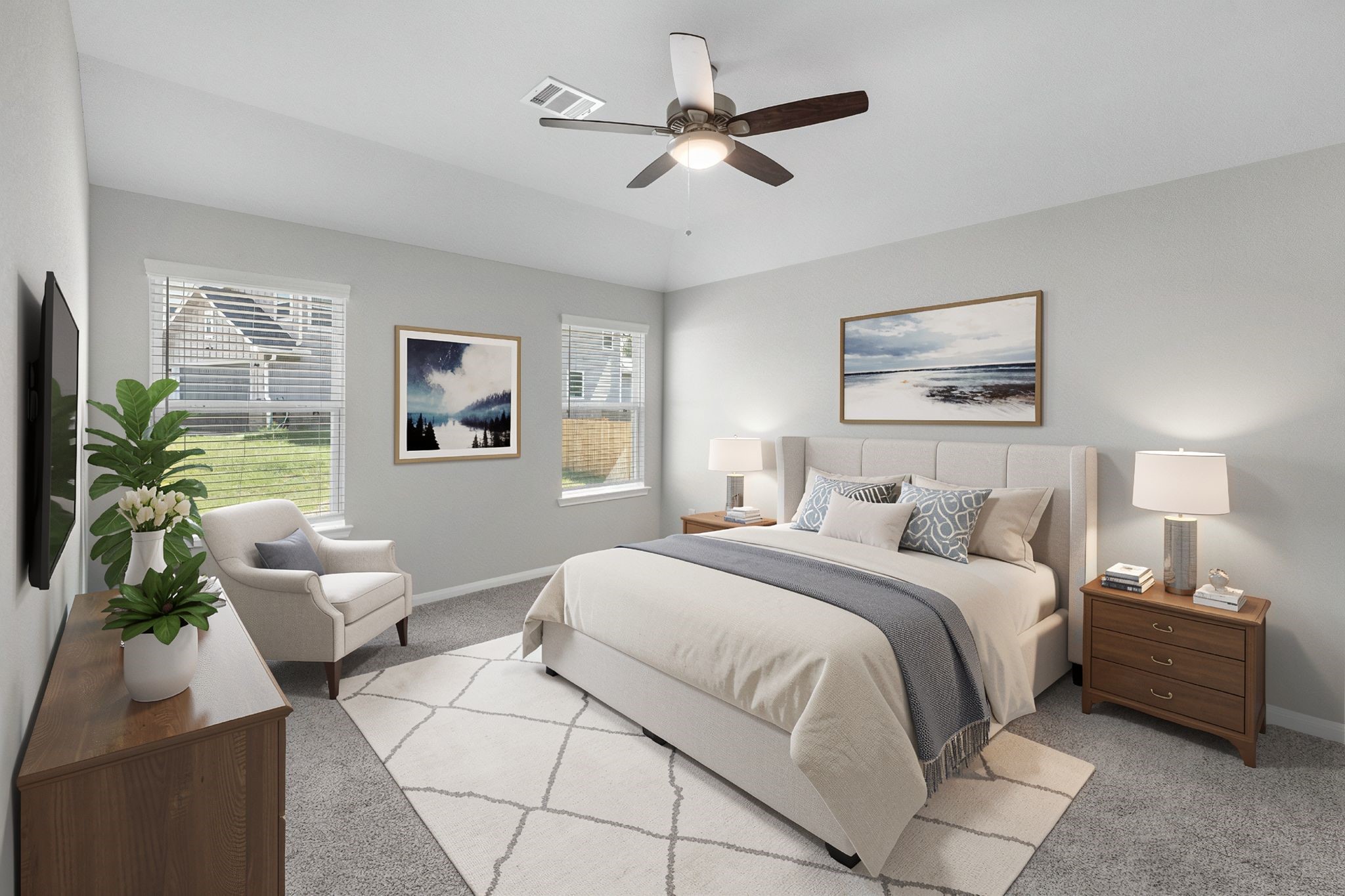 The primary bedroom provides a relaxing retreat at the back of the home. Virtually staged to show furniture placement.