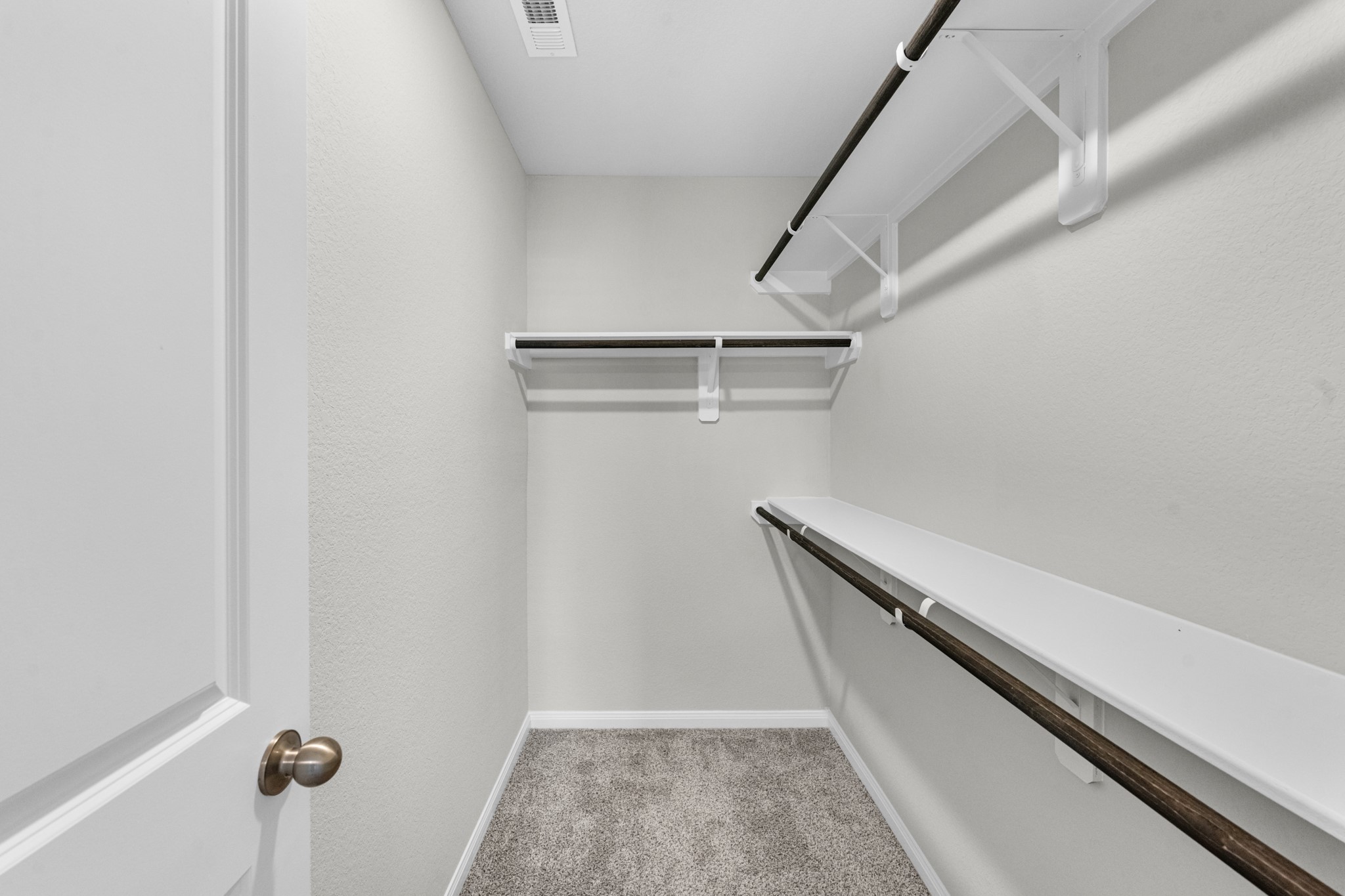 Plenty of storage in the primary's walk in closet!