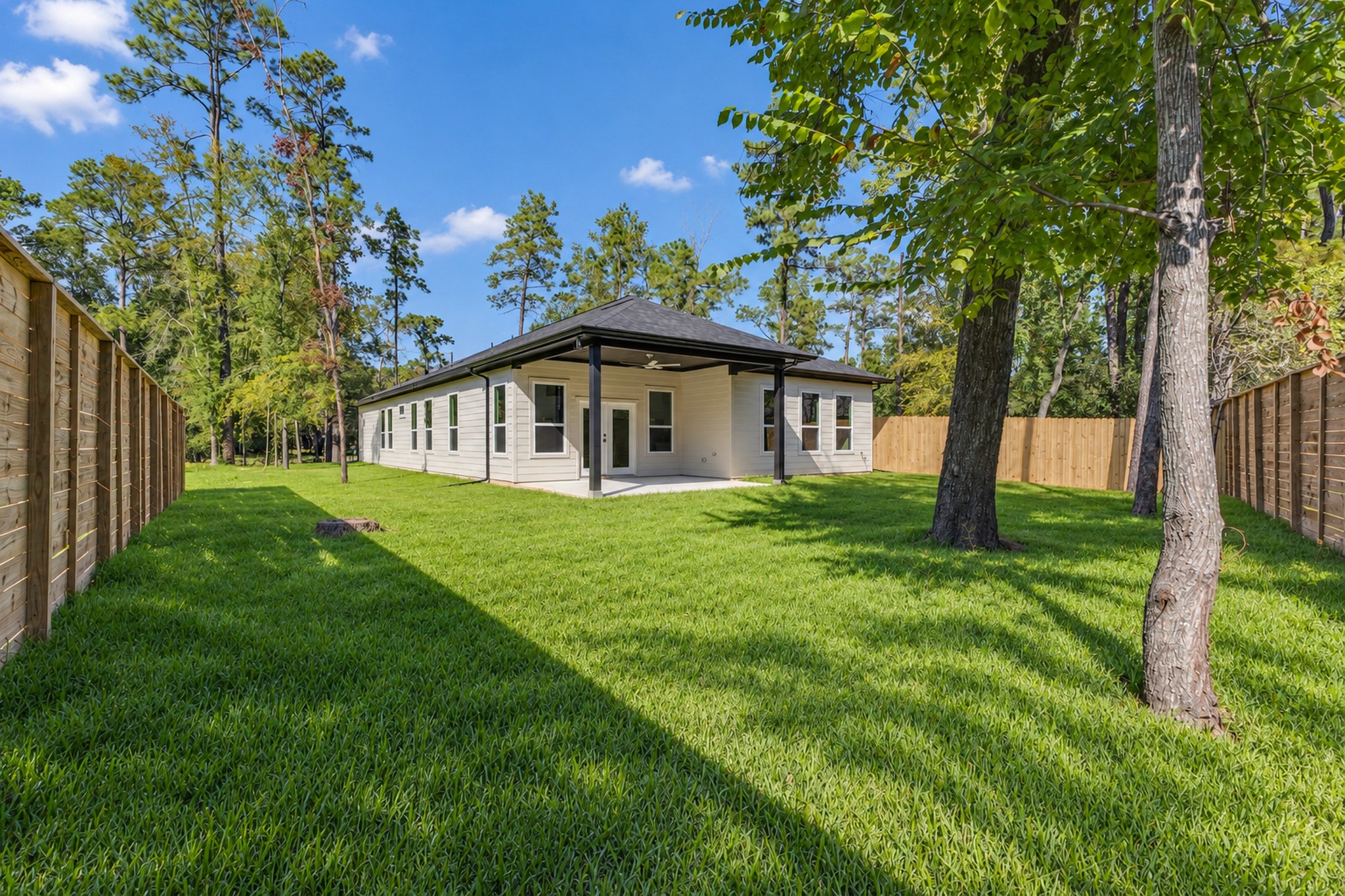 Spacious Backyard with Mature Trees