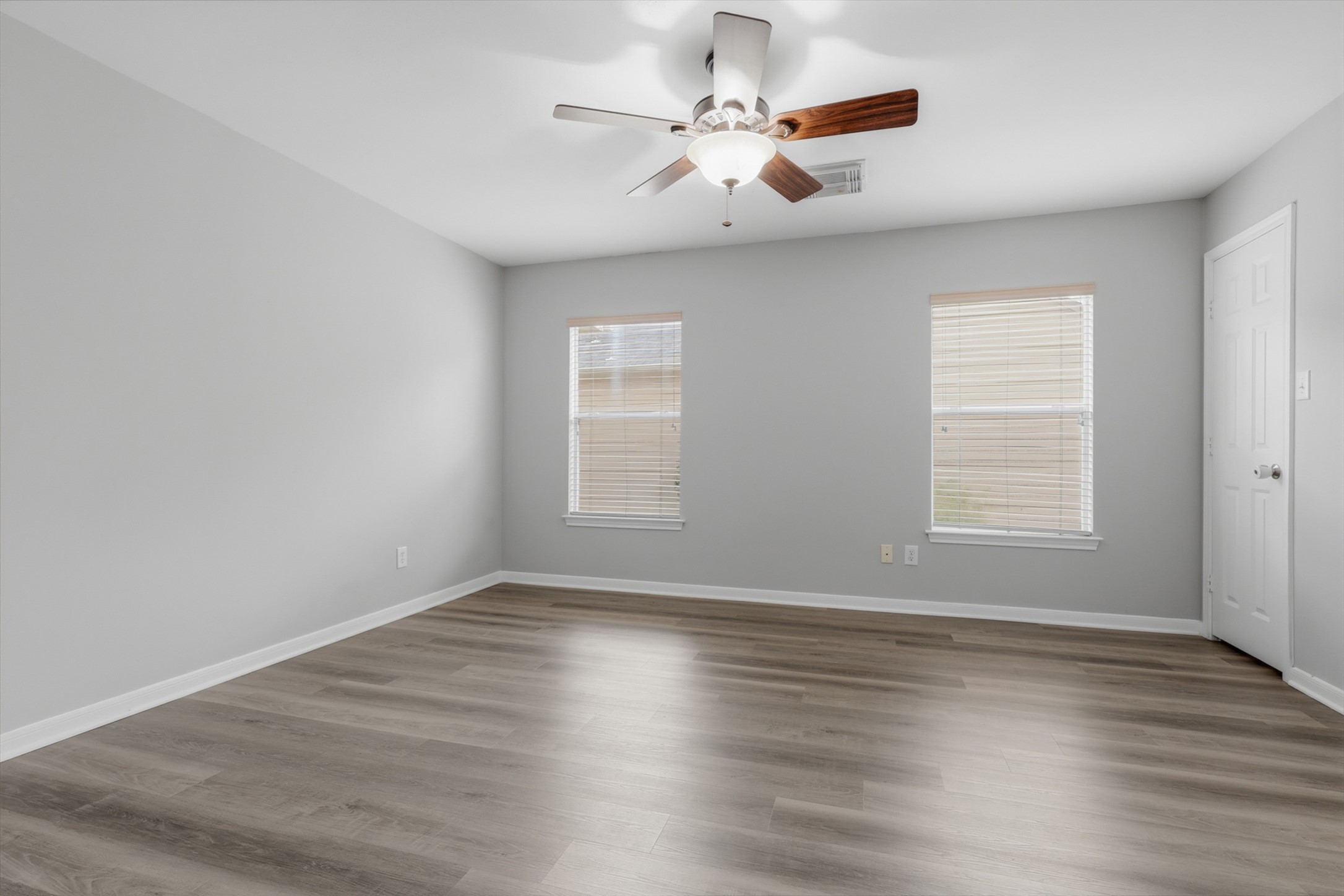 Bright Secondary Bedroom with Ceiling Fan