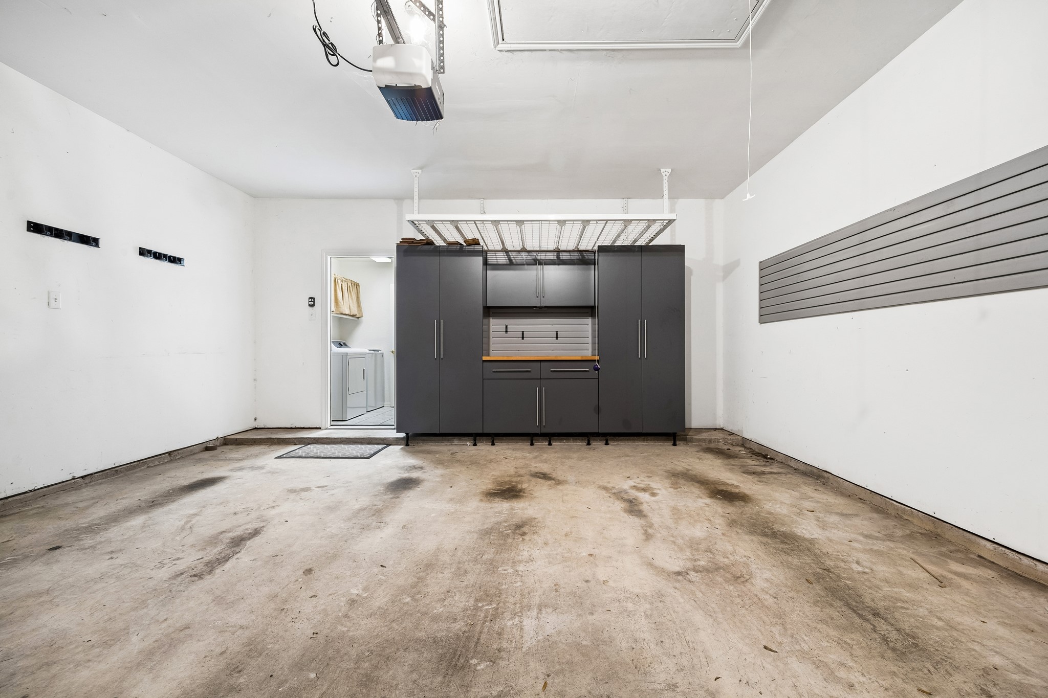 Thoughtful updates and hidden features add everyday convenience and peace of mind, including a 2025 electrical panel, 2016 roof, termite bait system, owned security system and 2 solar powered attic fans designed to help reduce attic heat. The 2-car garage with remote openers also works hard, with a ceiling mounted storage system and attic decking that add valuable storage without interfering with parking.