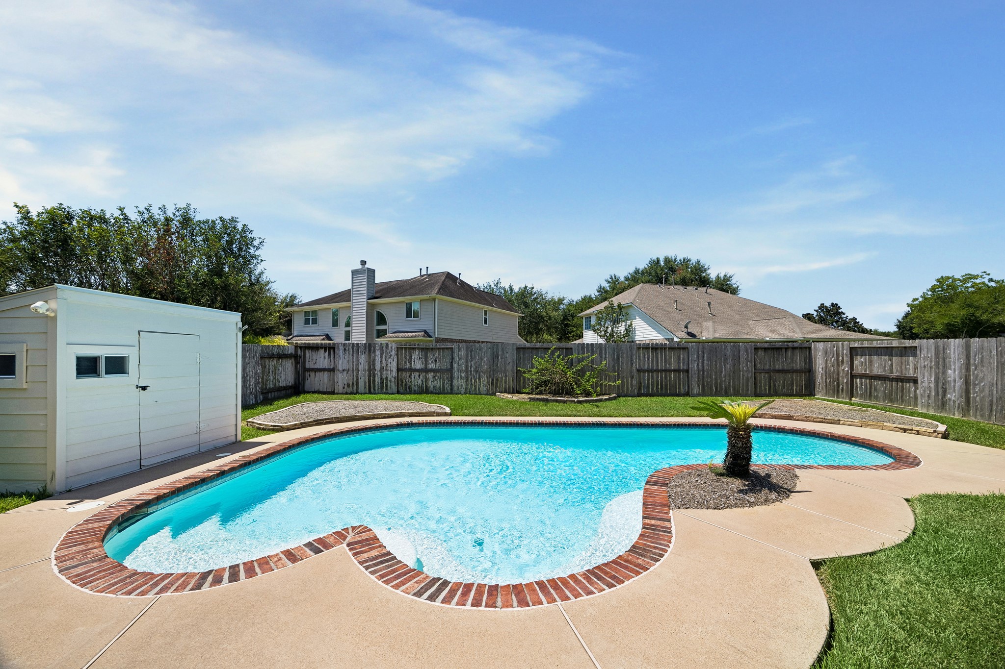More than just a pretty backdrop, this pool is ready for serious enjoyment with 33 feet from end to end, depths ranging from 3 to 8 feet and plenty of sunny deck space for lounging between swims.