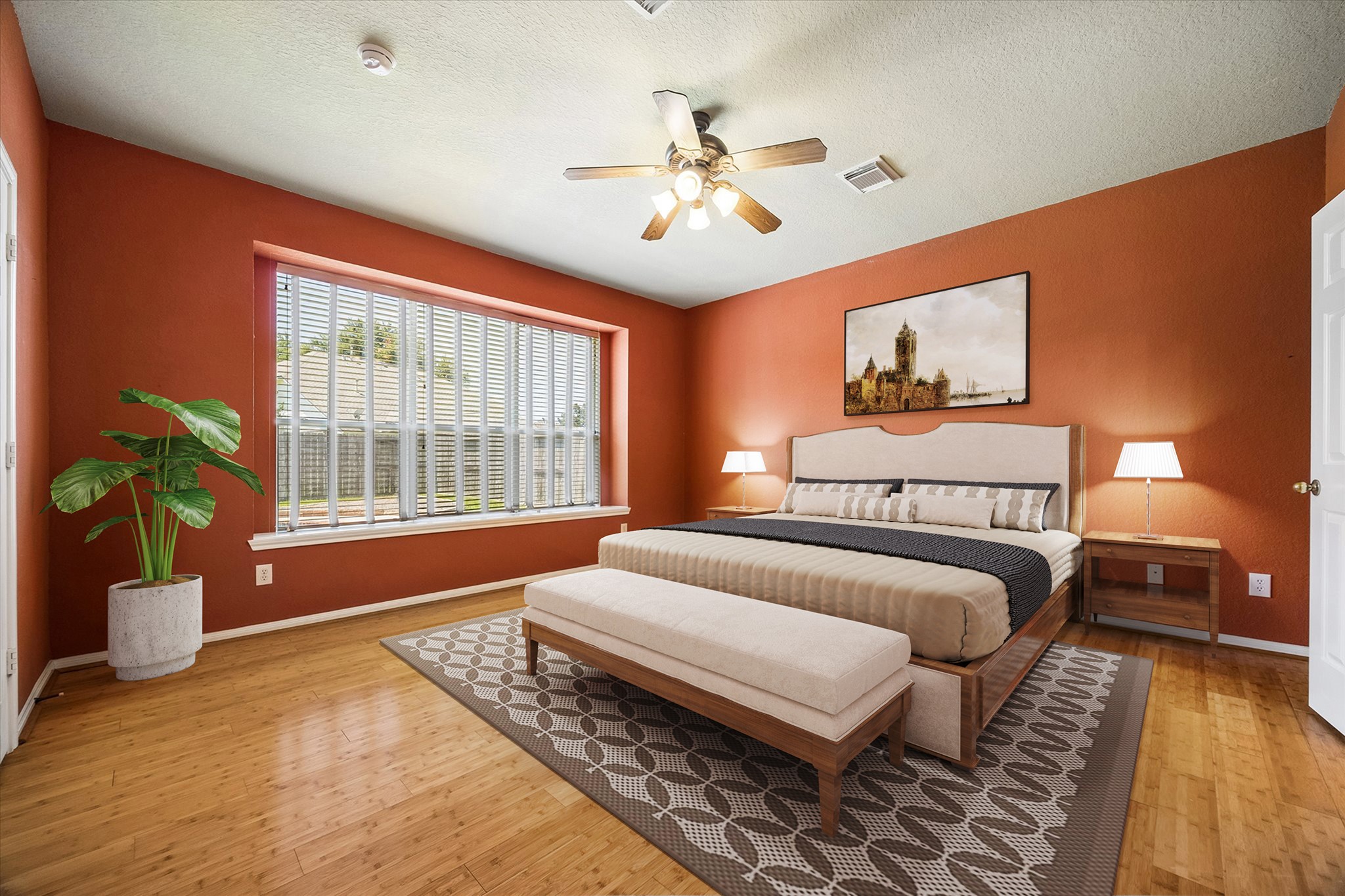 Stretch out and unwind in this roomy owners retreat, where a large window fills the space with natural light and a deep window ledge adds a charming architectural touch.