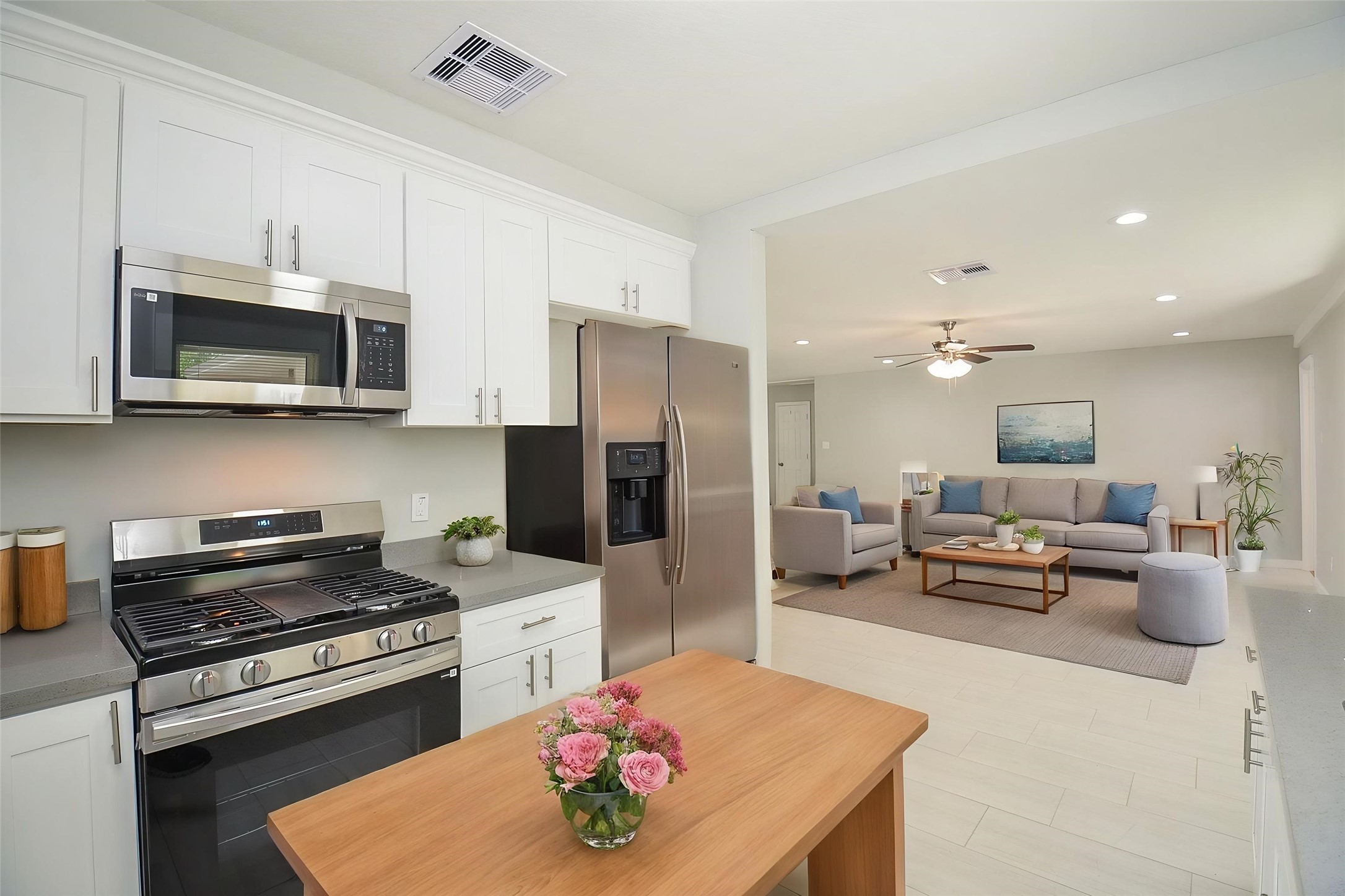 Photos are staged for marketing purposes. Refrigerator is not included and is not present in the home.