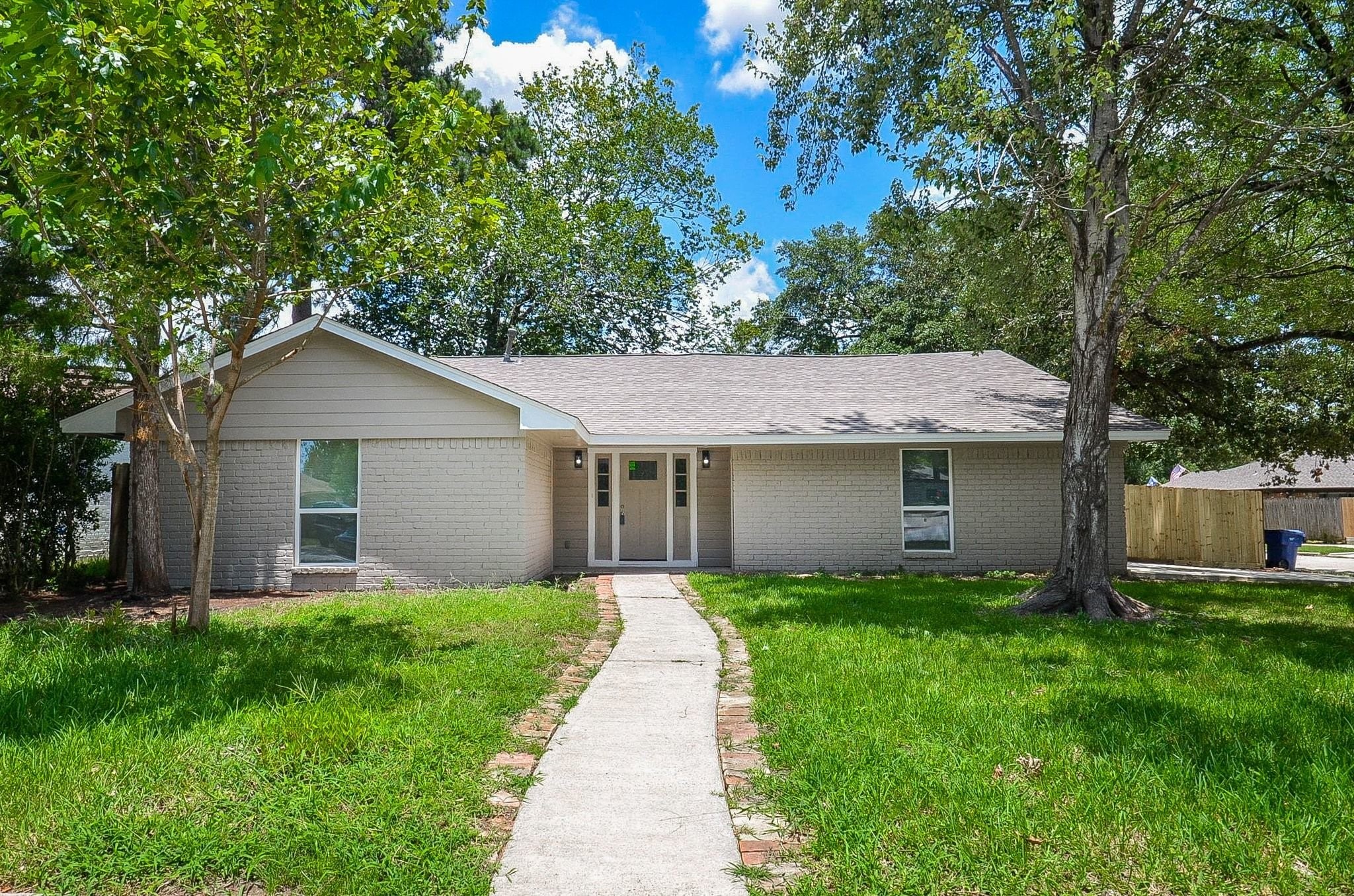 The gorgeous walkway to the covered porch gives an amazing curb appeal.
