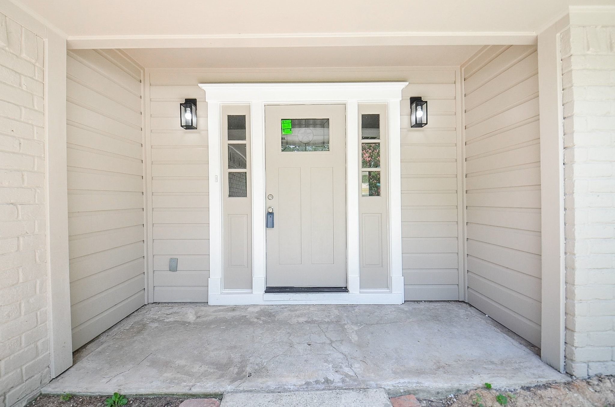 The front porch allows space to enjoy a morning coffee.