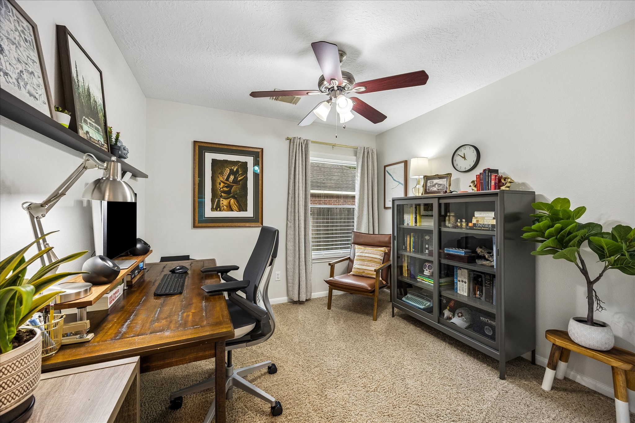 Work from home in style! Currently used as a home office, this versatile fourth bedroom offers a spacious, comfortable setting for productivity, with plenty of room for desks, shelving, and organization. Easily adaptable to suit your needs!