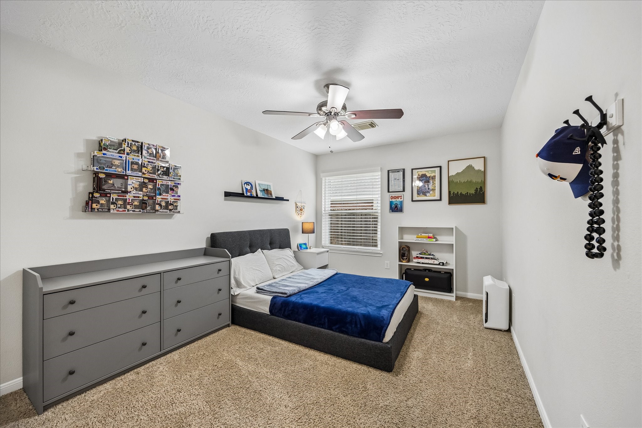 Comfortable, inviting, and full of possibilities! This generously sized secondary bedroom offers a versatile space thats perfect for family, guests, or creating a retreat of your own.
