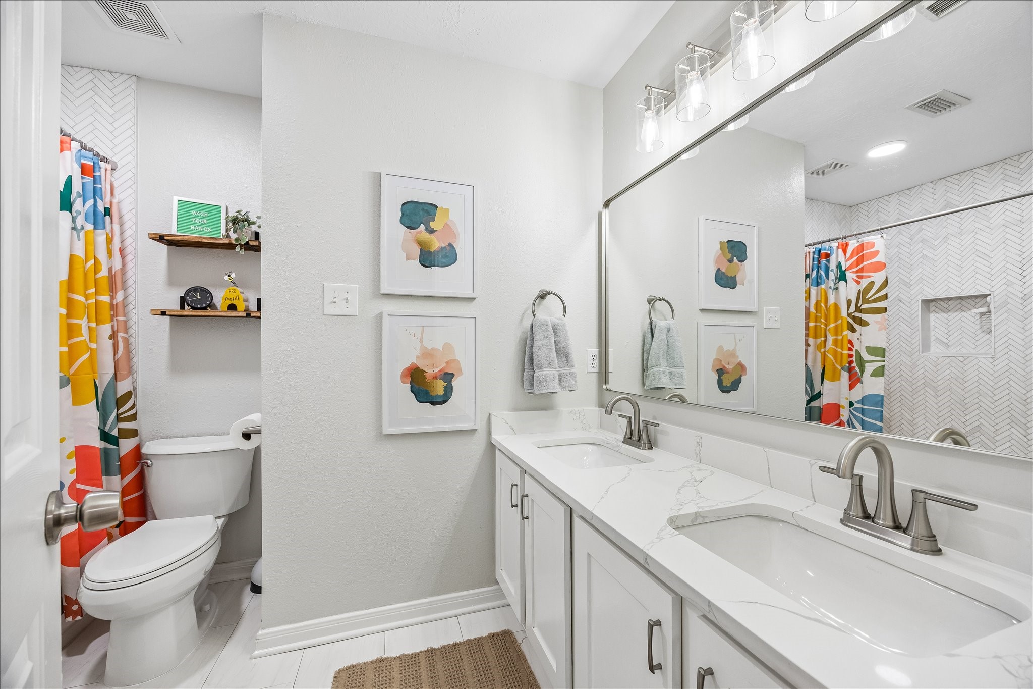 Even the secondary bathroom received a stunning transformation! Completely remodeled in 2024, this beautiful space features quartz countertops, a new vanity, updated fixtures, and stylish tilework. No detail was overlooked!