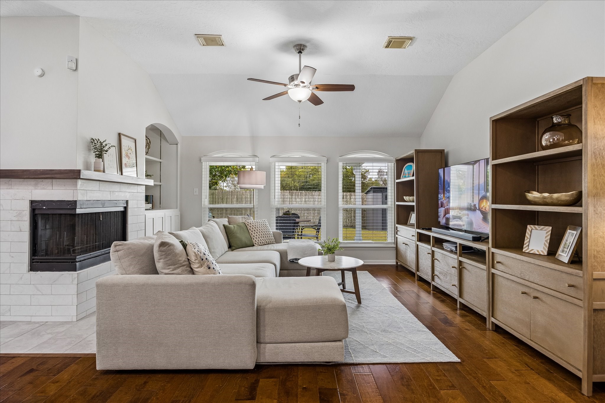A space designed for making memories! This generously sized family room offers an inviting atmosphere, an easy-flowing layout, and plenty of flexibility for arranging furniture to suit your lifestyle. Comfortable, spacious, and perfect for everyday living or entertaining!