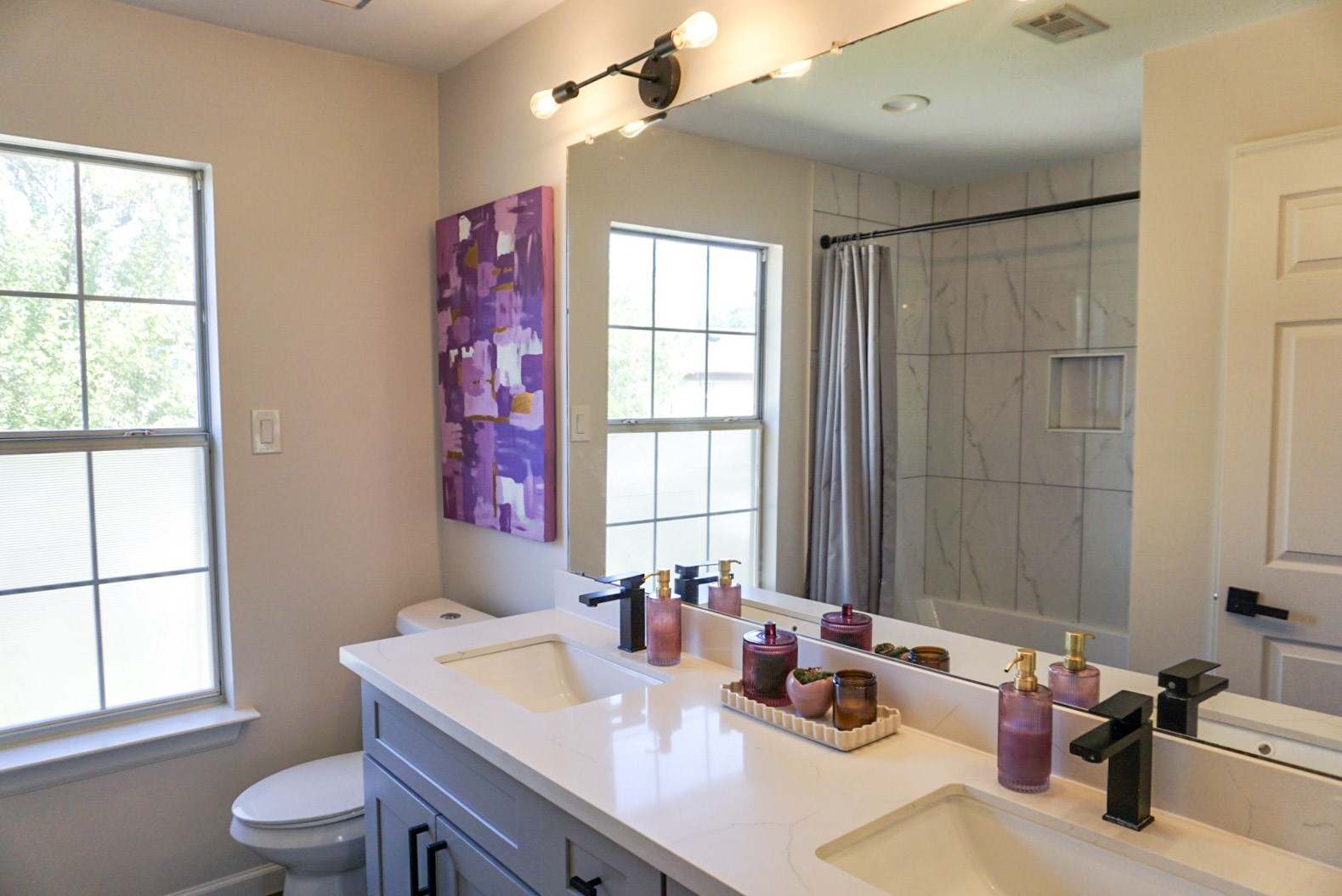 Secondary bathroom upstairs, with double vanity sink