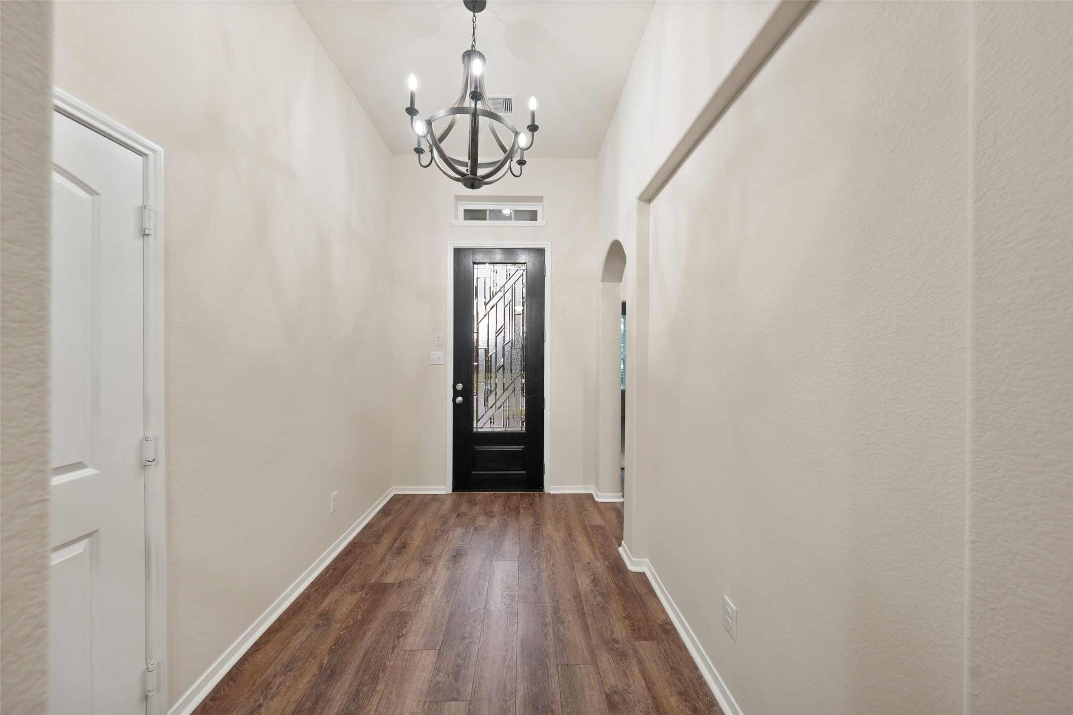 As you walk into this beautiful home, you will be greeted by a beautiful foyer outfitted with a custom front door and upgraded chandelier. The engineered wood floors are thought out most of th first floor. As you walk into this beautiful home, you will be greeted by a beautiful foyer outfitted with a custom front door and upgraded chandelier. The engineered wood floors are thought out most of th first floor.