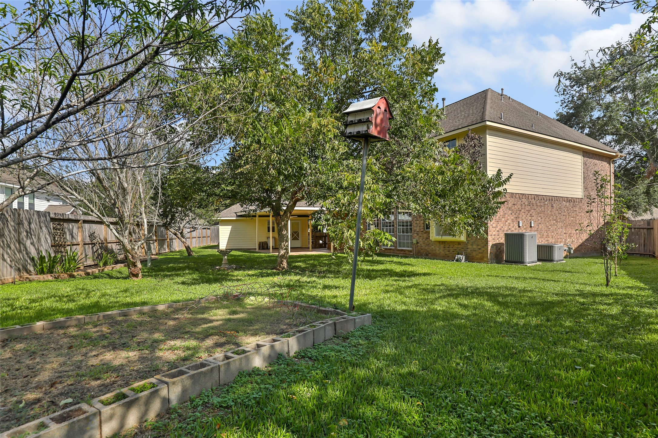 Backyard with raised gardening area