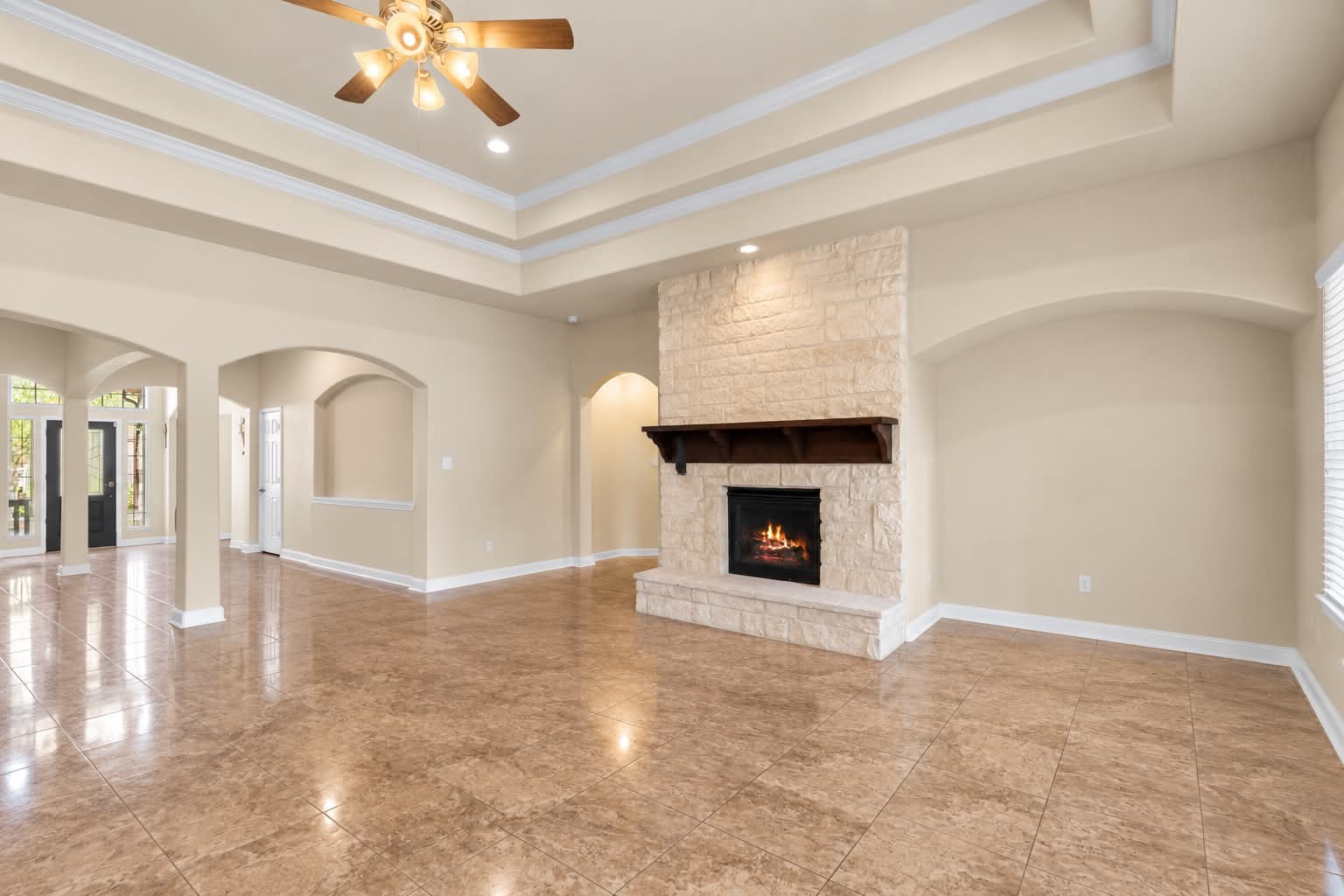A clear look at the family room footprint, fireplace, and gleaming floors. A clear look at the family room footprint, fireplace, and gleaming floors.
