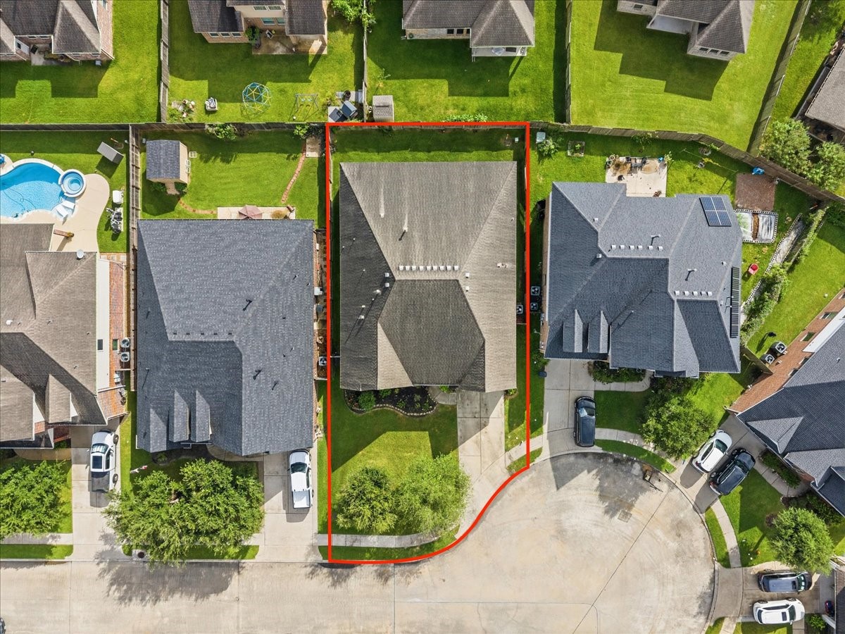 Overhead aerial view of the home and lot.