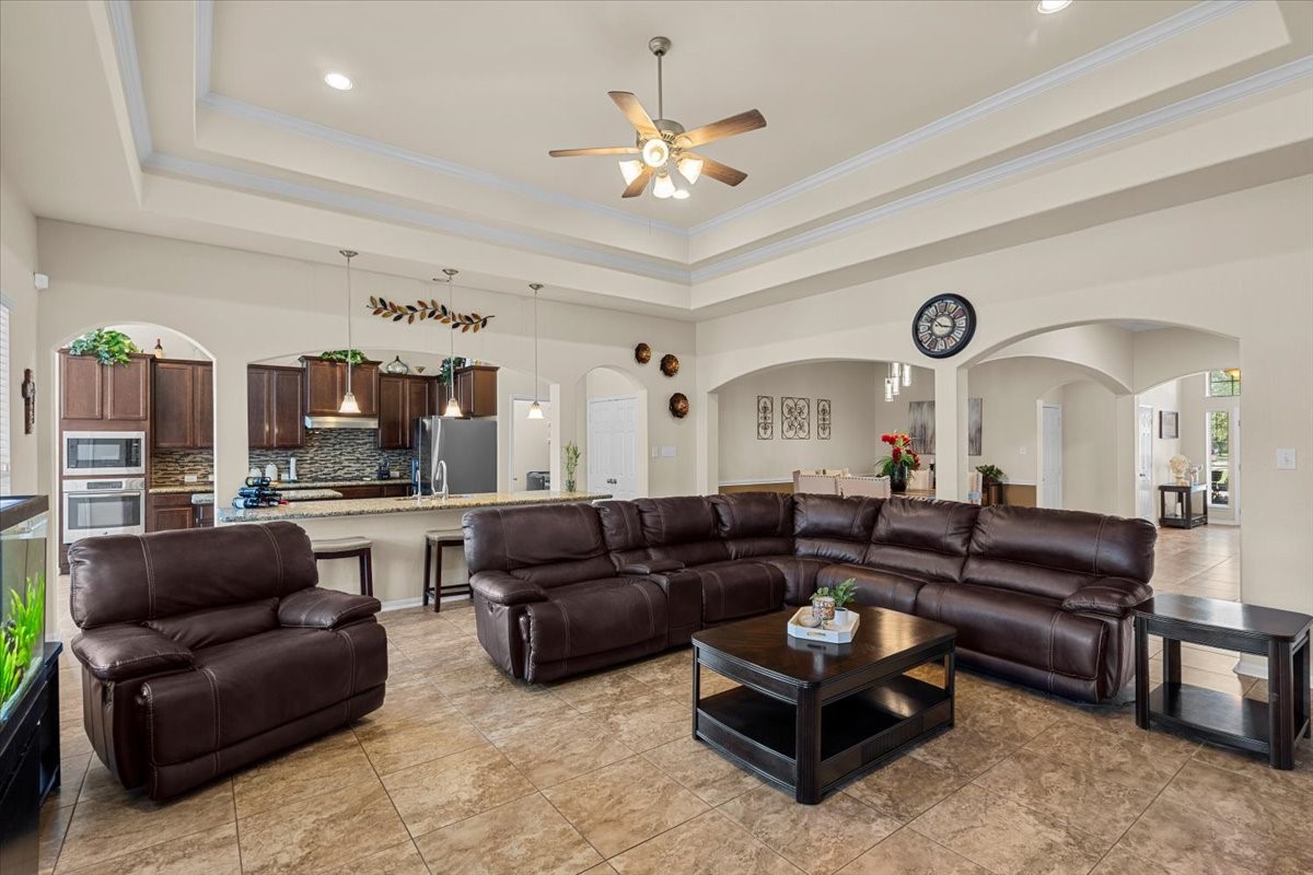 Wide-angle view of the family room showcasing its generous size.