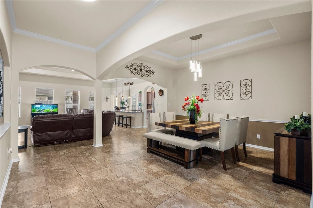 Dining room flows openly toward the main living areas, ideal for entertaining.