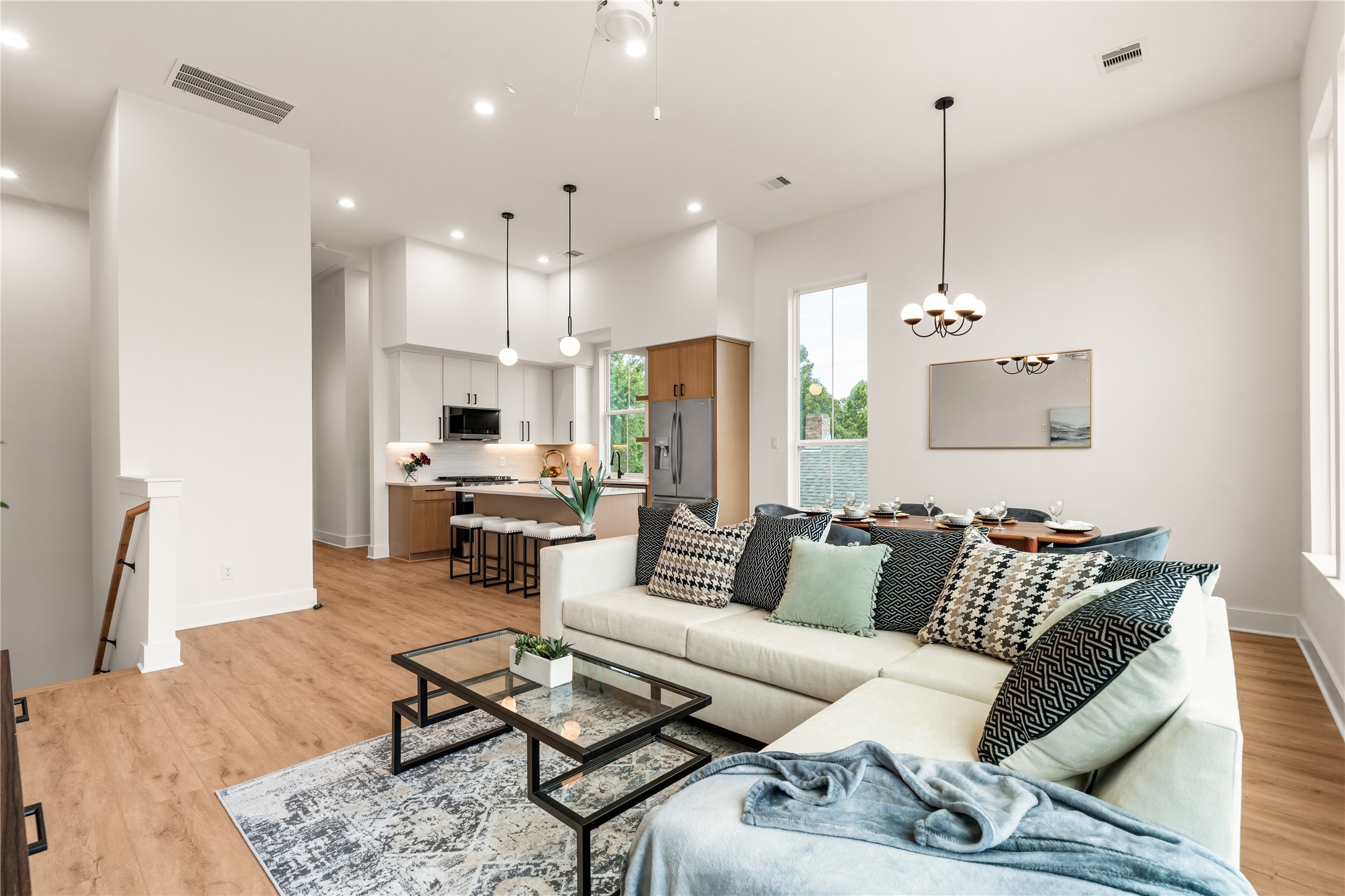 Effortless open layout connecting the main living, dining, and kitchen areas in one continuous flow.