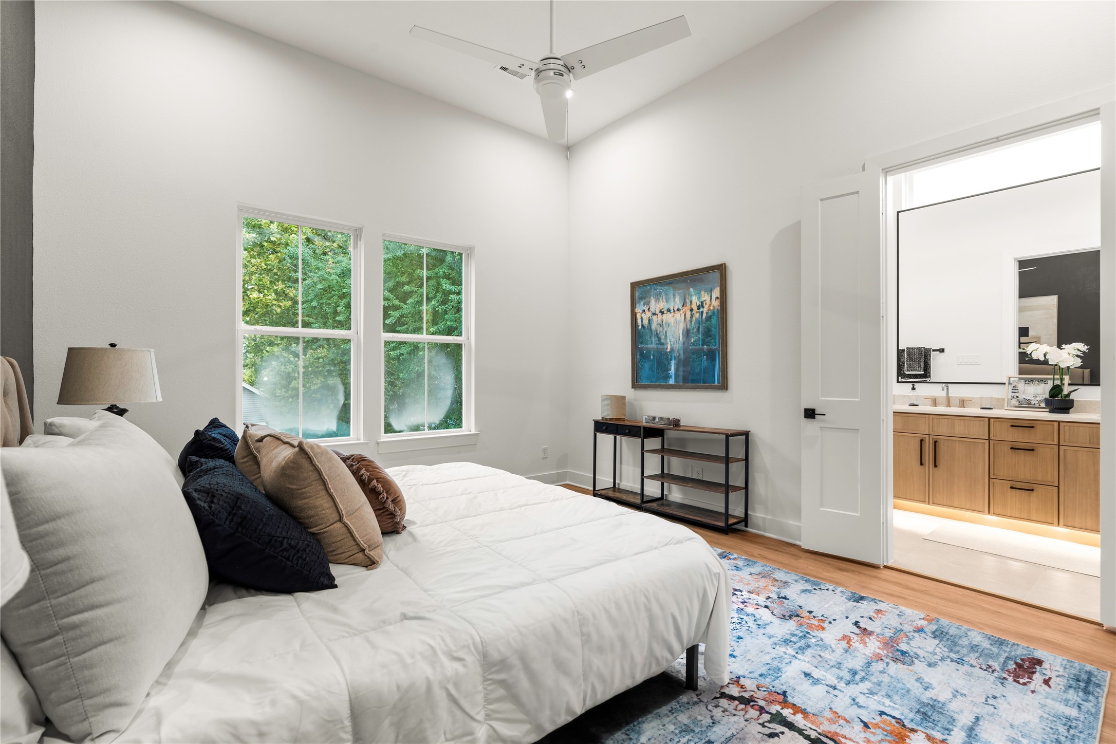 Spacious second-story primary bedroom built with room for large furnishings and lounge seating.
