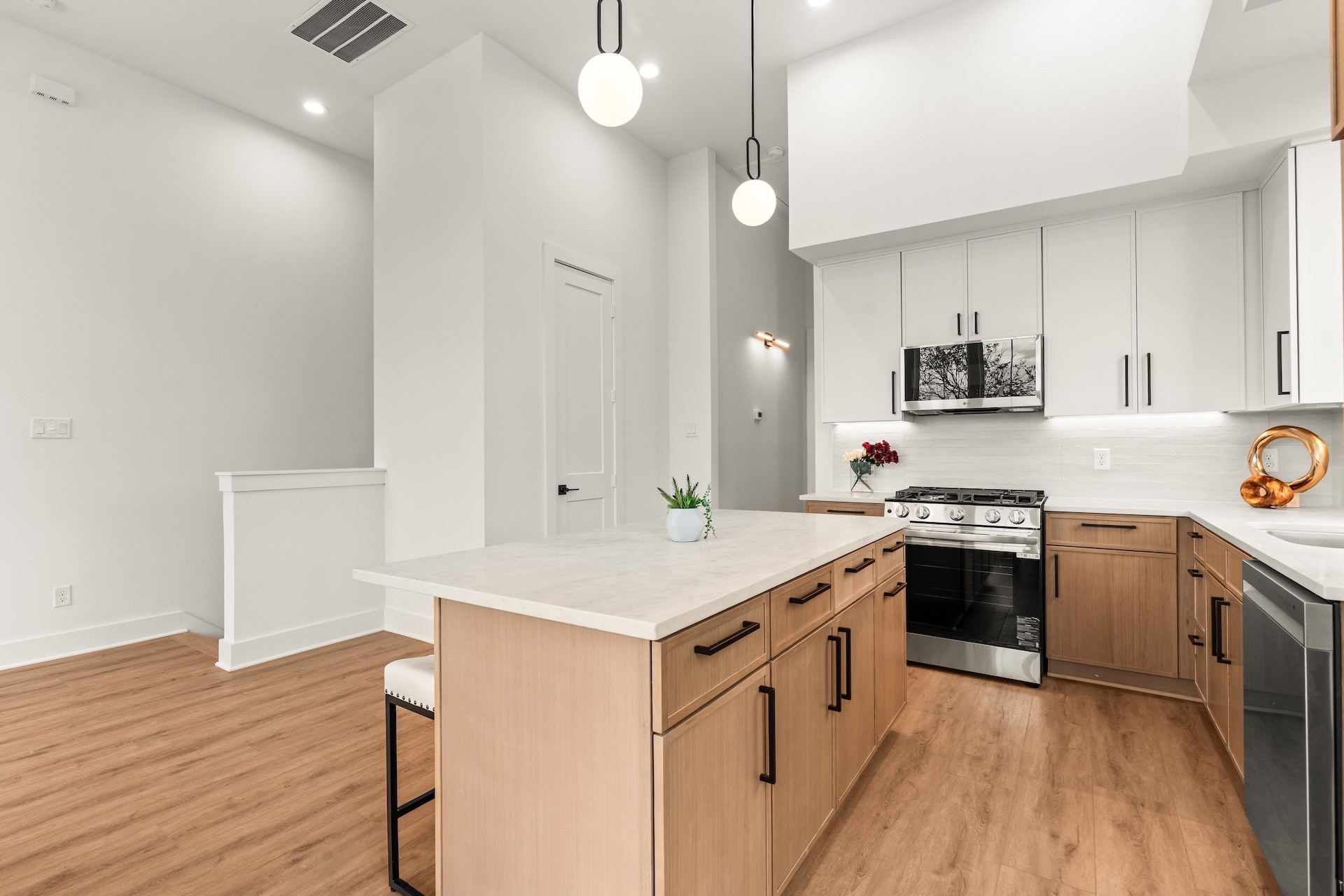 Chef-inspired prep station featuring under-cabinet task lighting, soft-close storage, and a walk-in pantry.