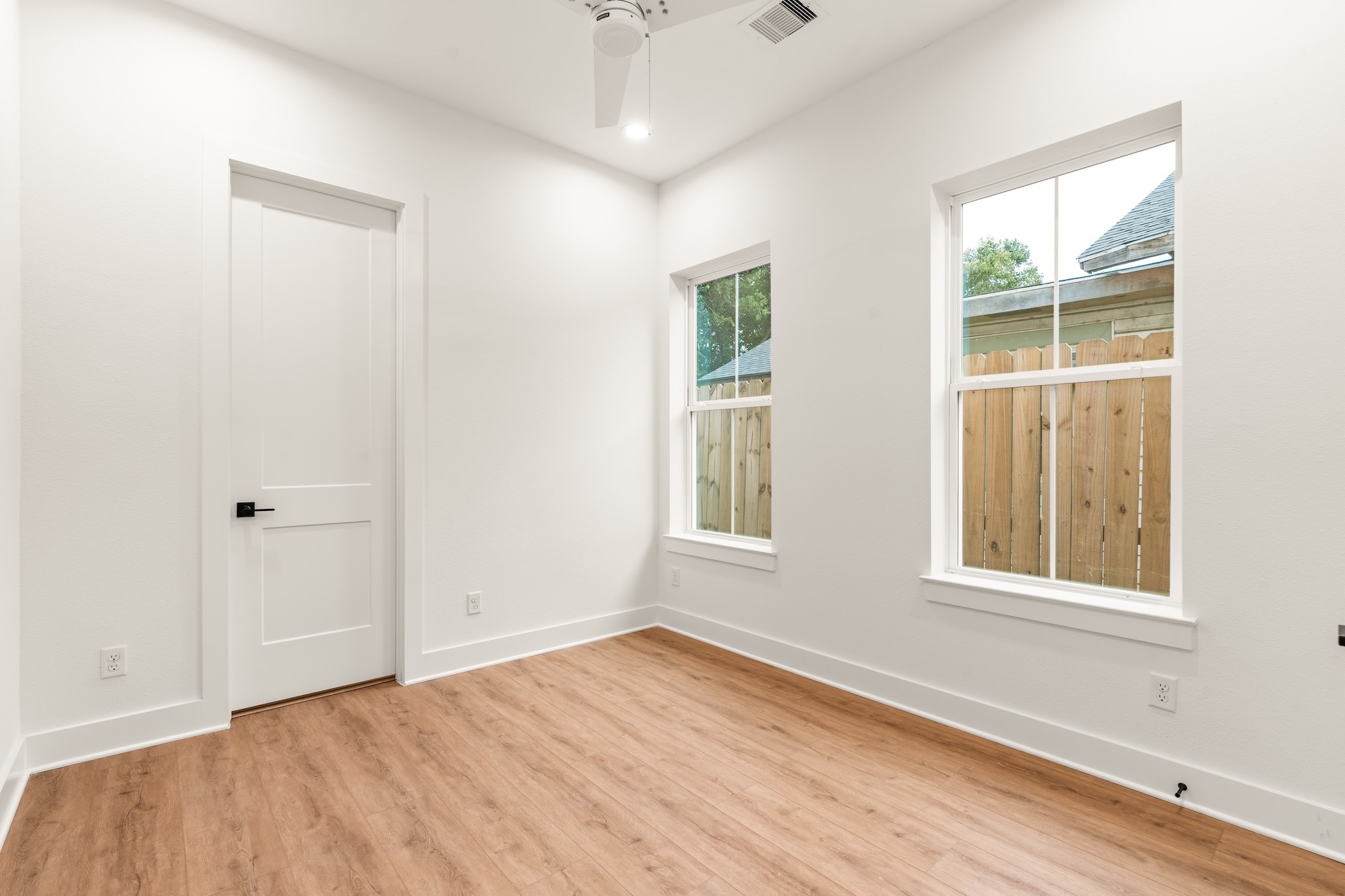 Bright, versatile first-floor space perfect for a home office, study, or guest room.