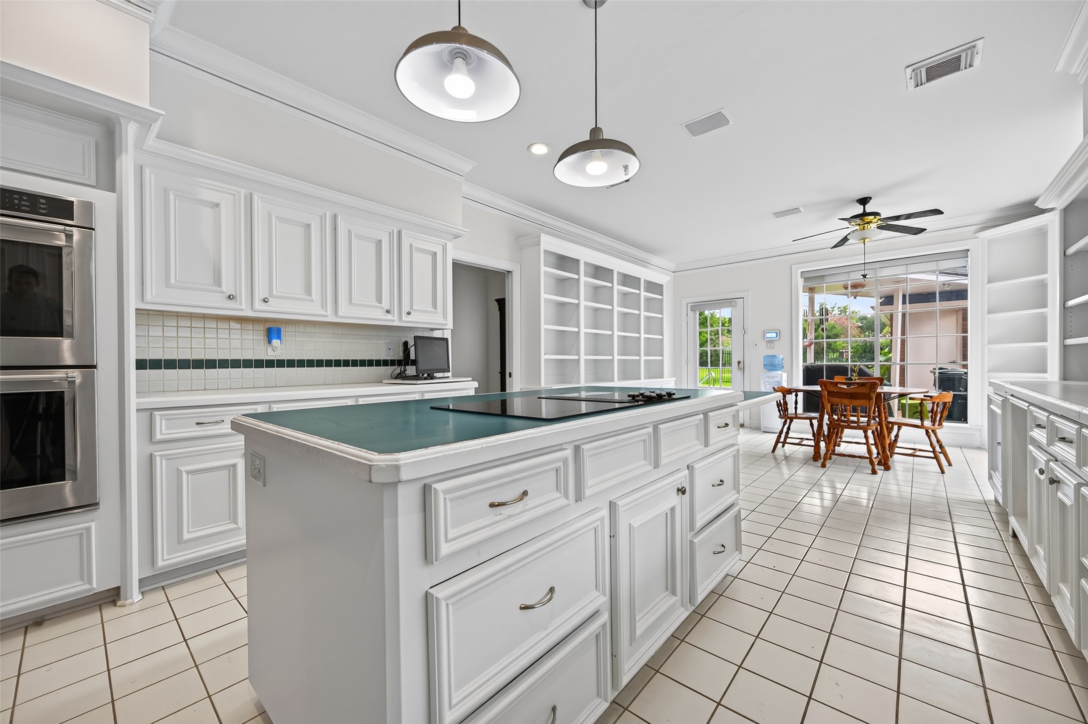 Spacious Kitchen offering crown molding throughout.