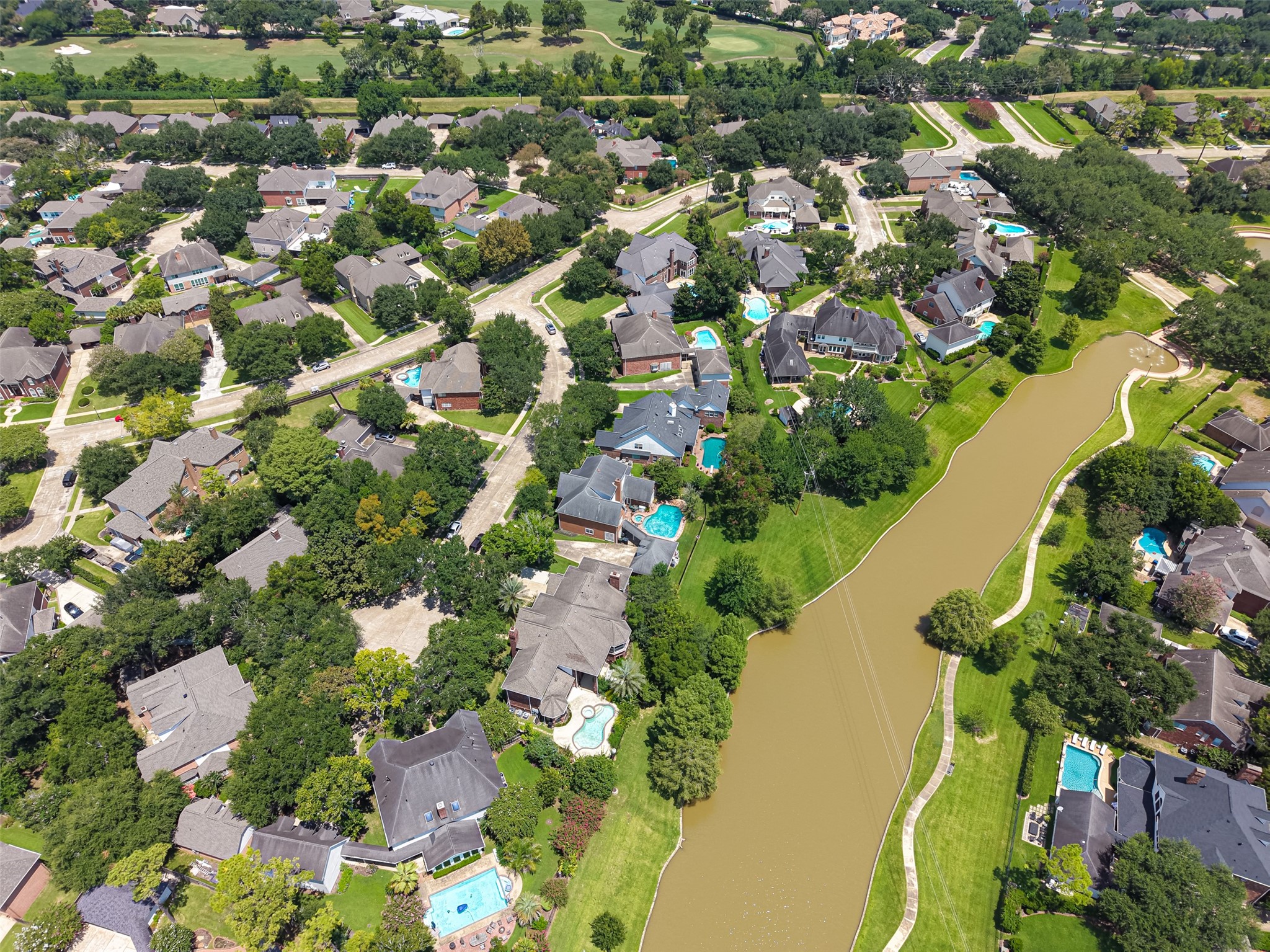 Nestled in a picturesque neighborhood, this stunning property offers lake views and lush greenery, creating a peaceful oasis in a vibrant community. Perfect for those seeking a blend of nature and modern living.