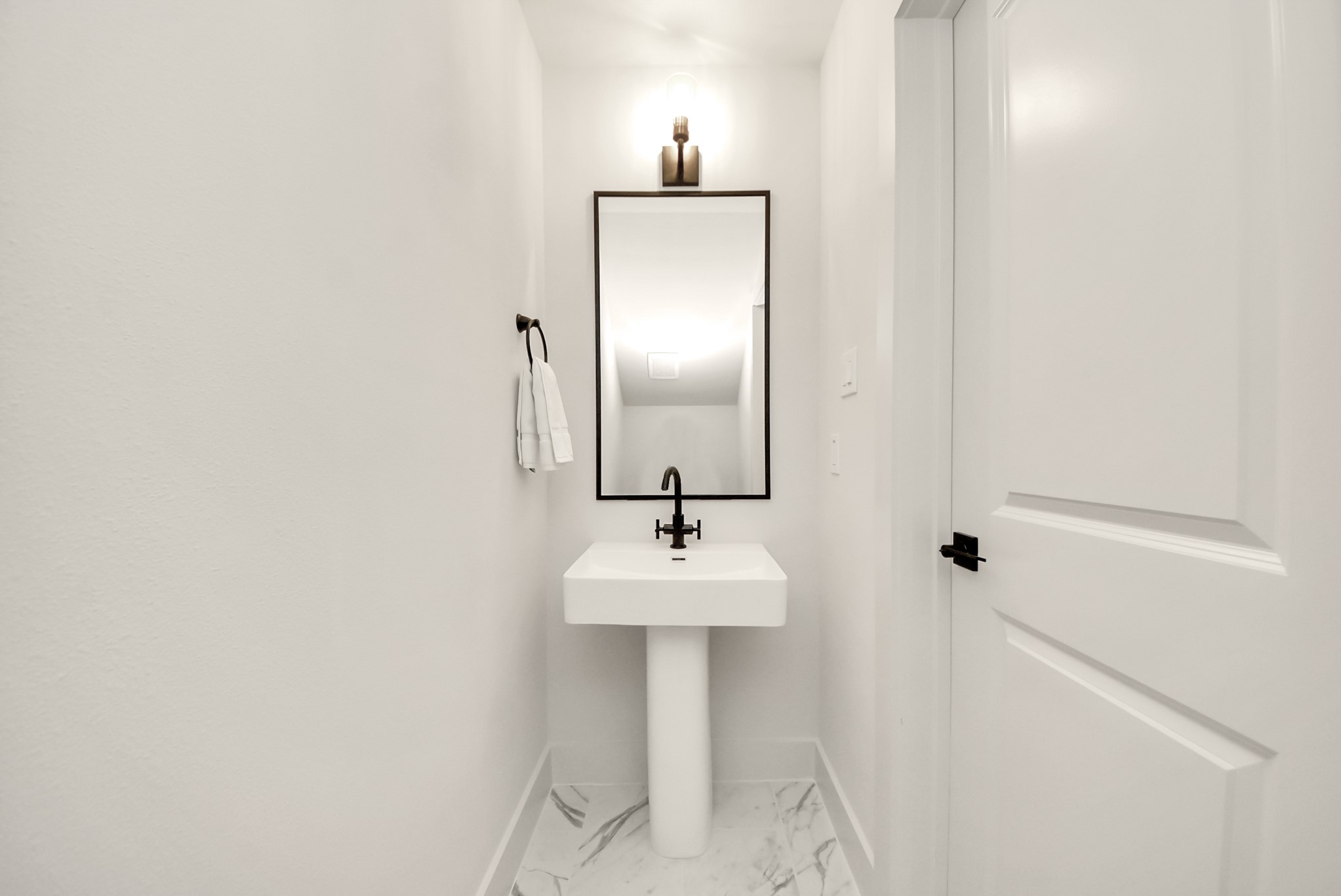 Half bath on the first floor of 5224 Edgewood St
