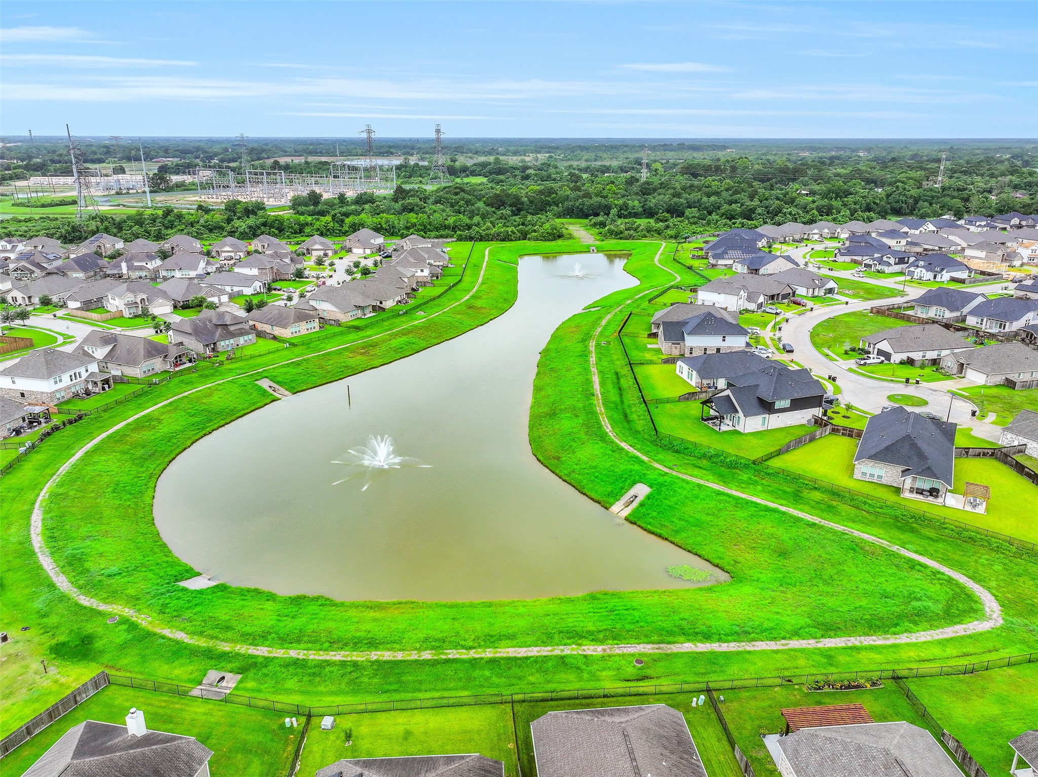 Beautiful lakes with fountains and walking trails add to the charm of Martha's Vineyard, providing residents with inviting green spaces to enjoy year-round just minutes from home.