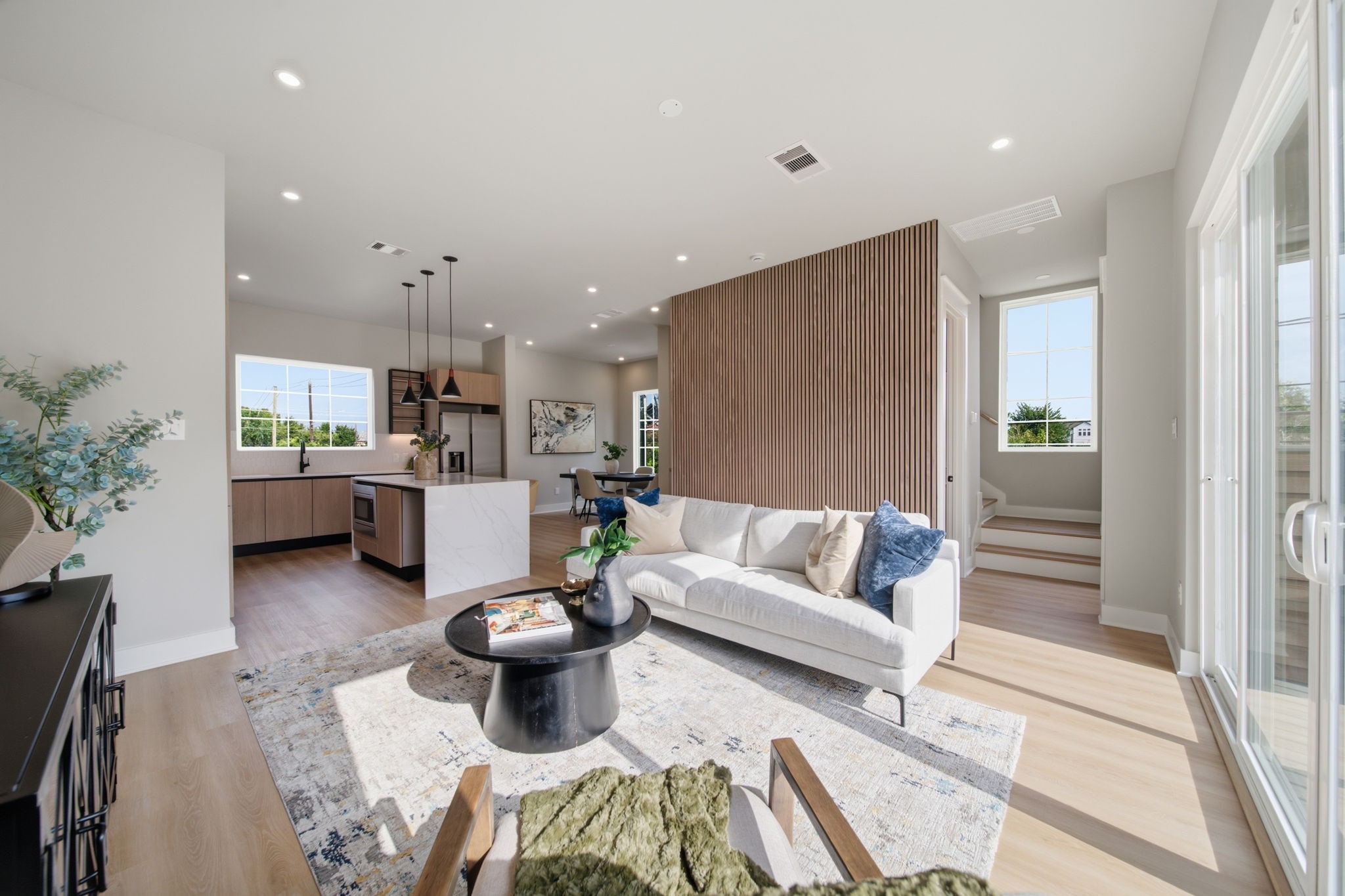 Open concept spacious living room and kitchen Open concept spacious living room and kitchen
