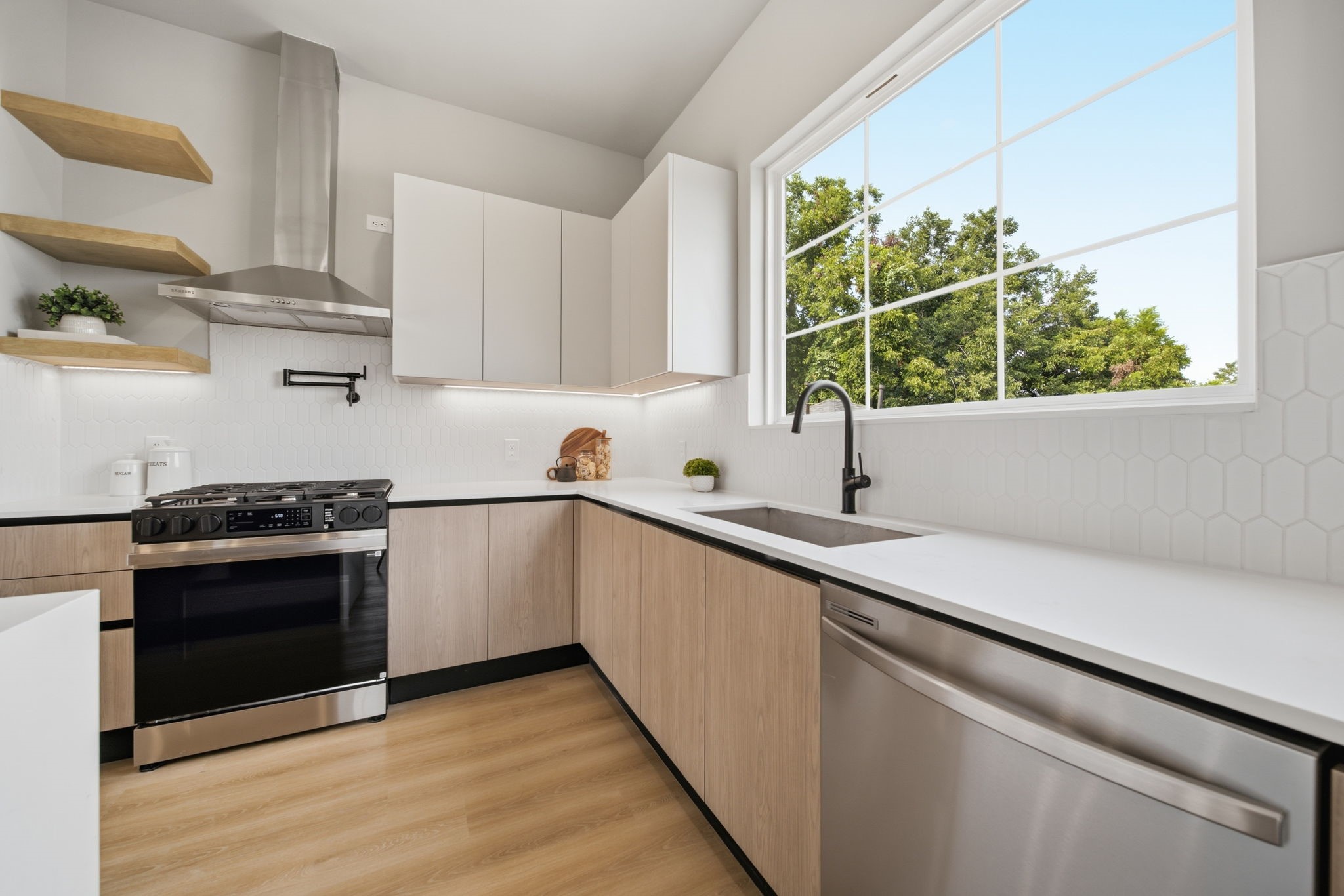 Stainless steel appliances, flat cabinetry, and more.