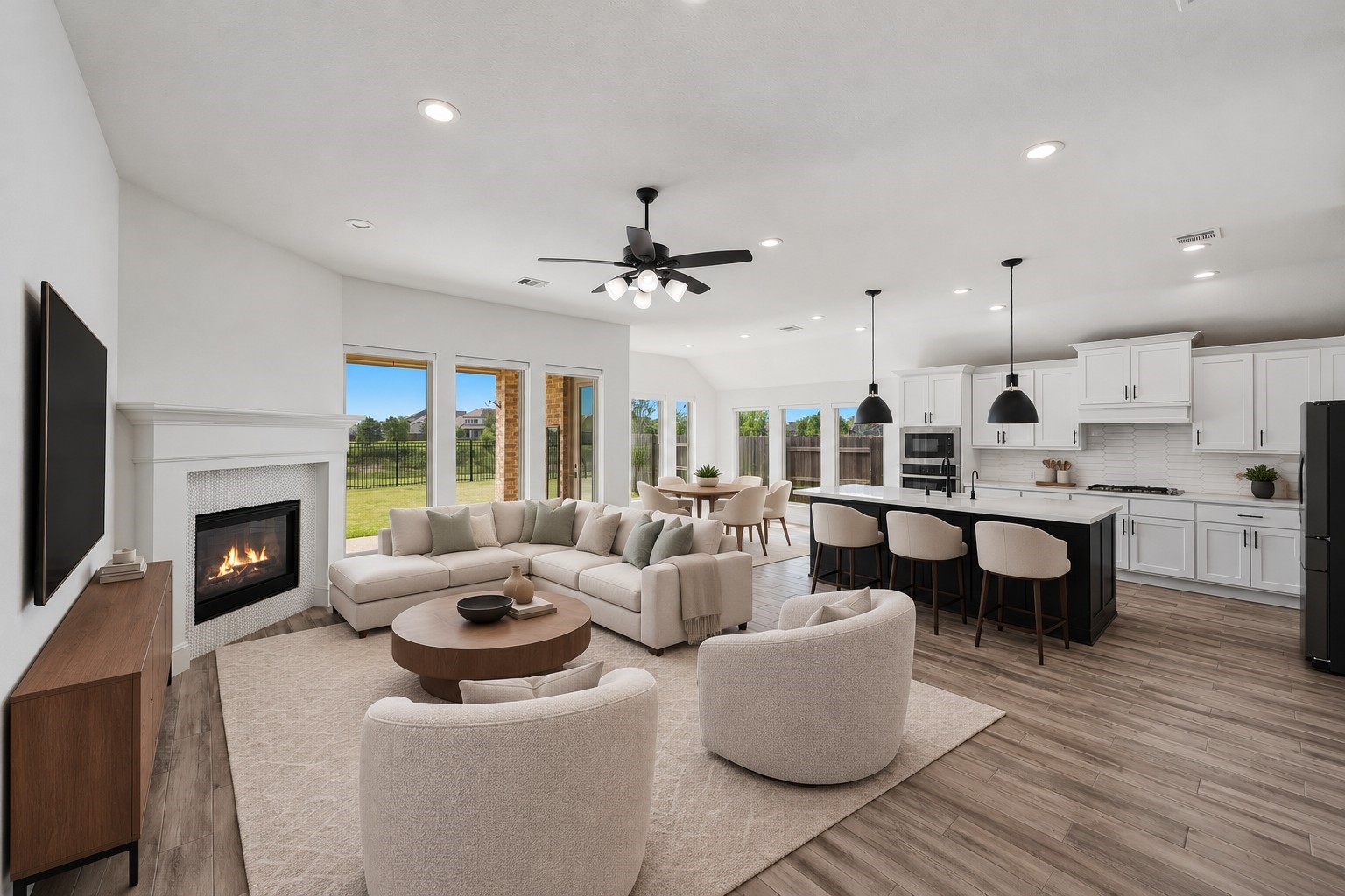 Virtually Staged: A sense of boundless depth defines this open pavilion layout, anchored by a corner hearth that naturally centers the room.