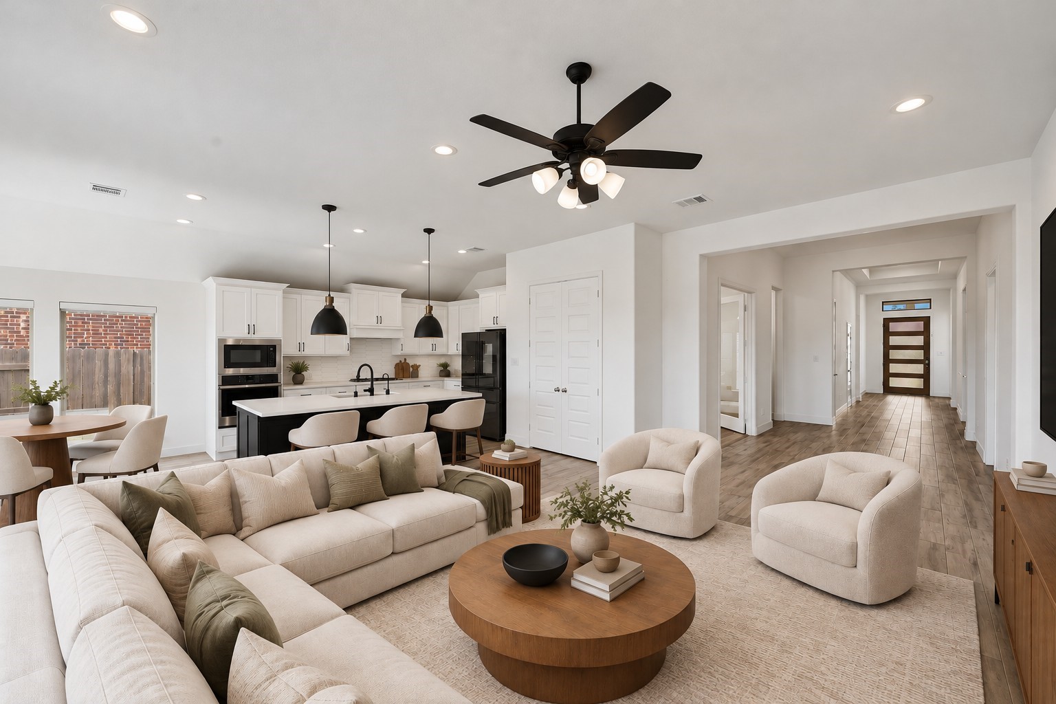 Virtually Staged: Generous spatial proportions define this expansive central layout, highlighted by an airy ceiling design and a seamless transition into the kitchen zone.