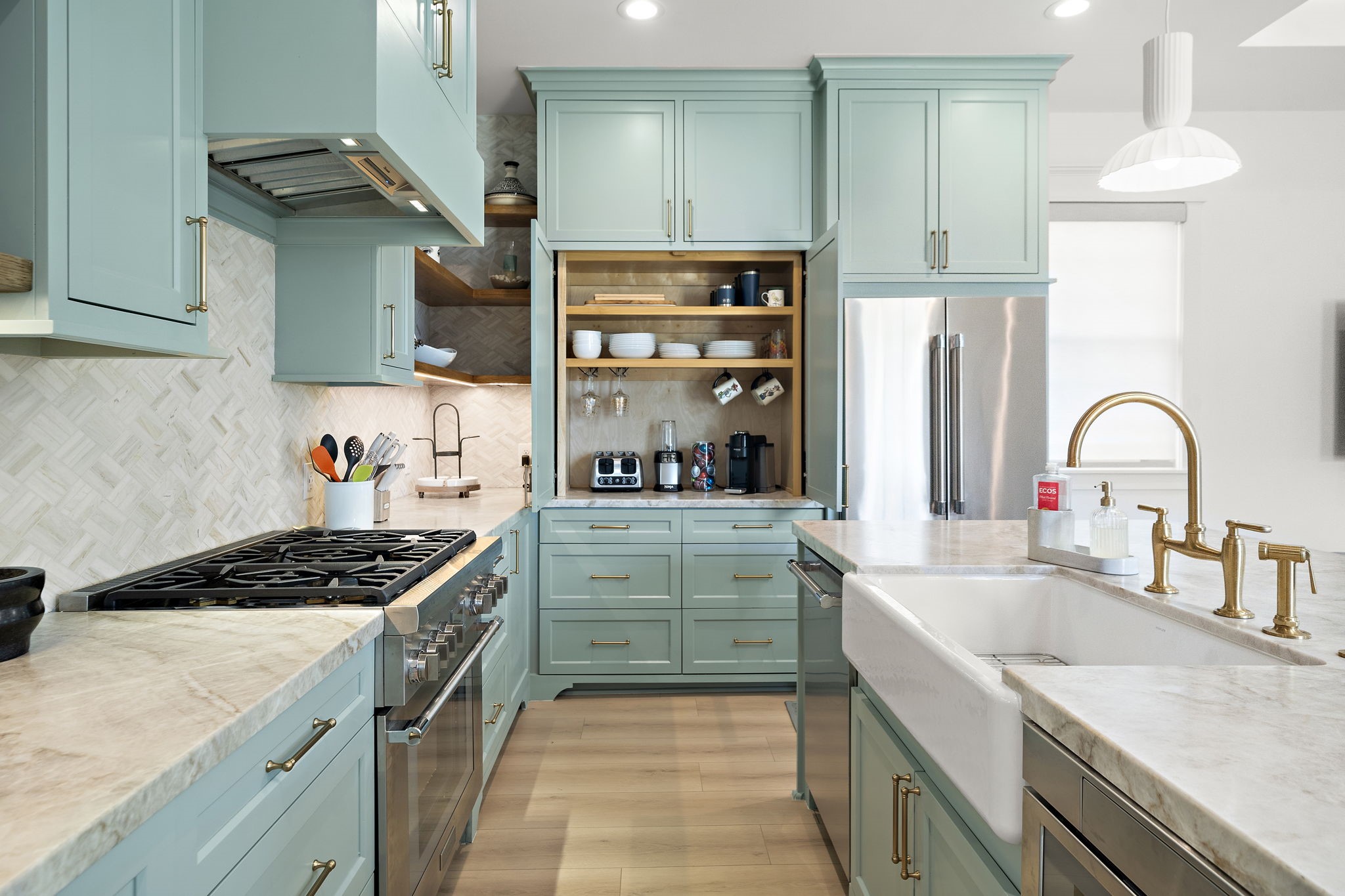 Talk about a chef kitchen - brand new Thermador appliances, gas grill, hood vent that could move mountains, and coffee bar.