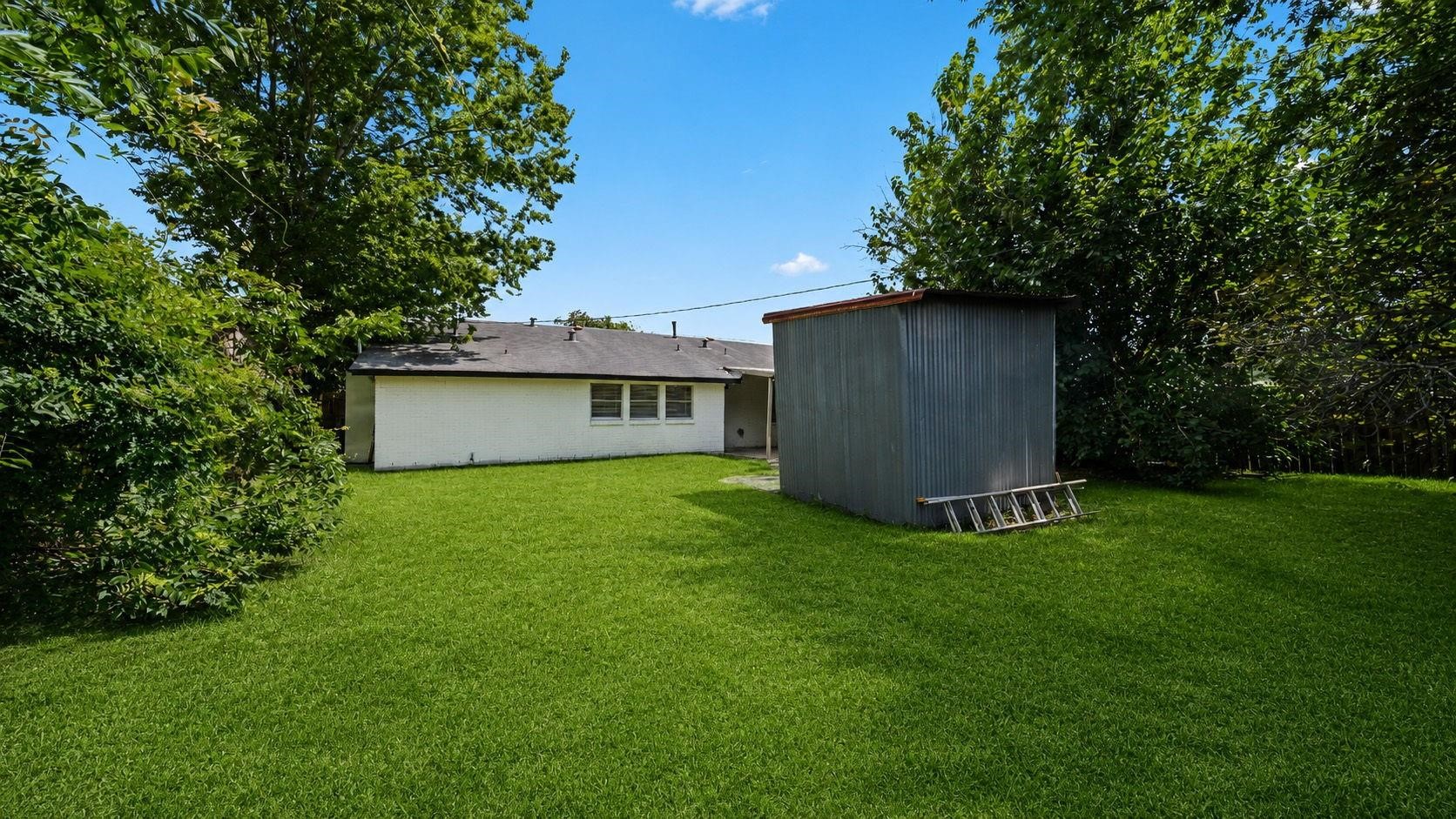 The expansive backyard offers exceptional space and endless possibilities for outdoor enjoyment. Whether creating a beautifully landscaped garden, designing a custom outdoor retreat, or enjoying ample room for recreation and pets, this generous setting provides the perfect canvas to bring your vision to life.