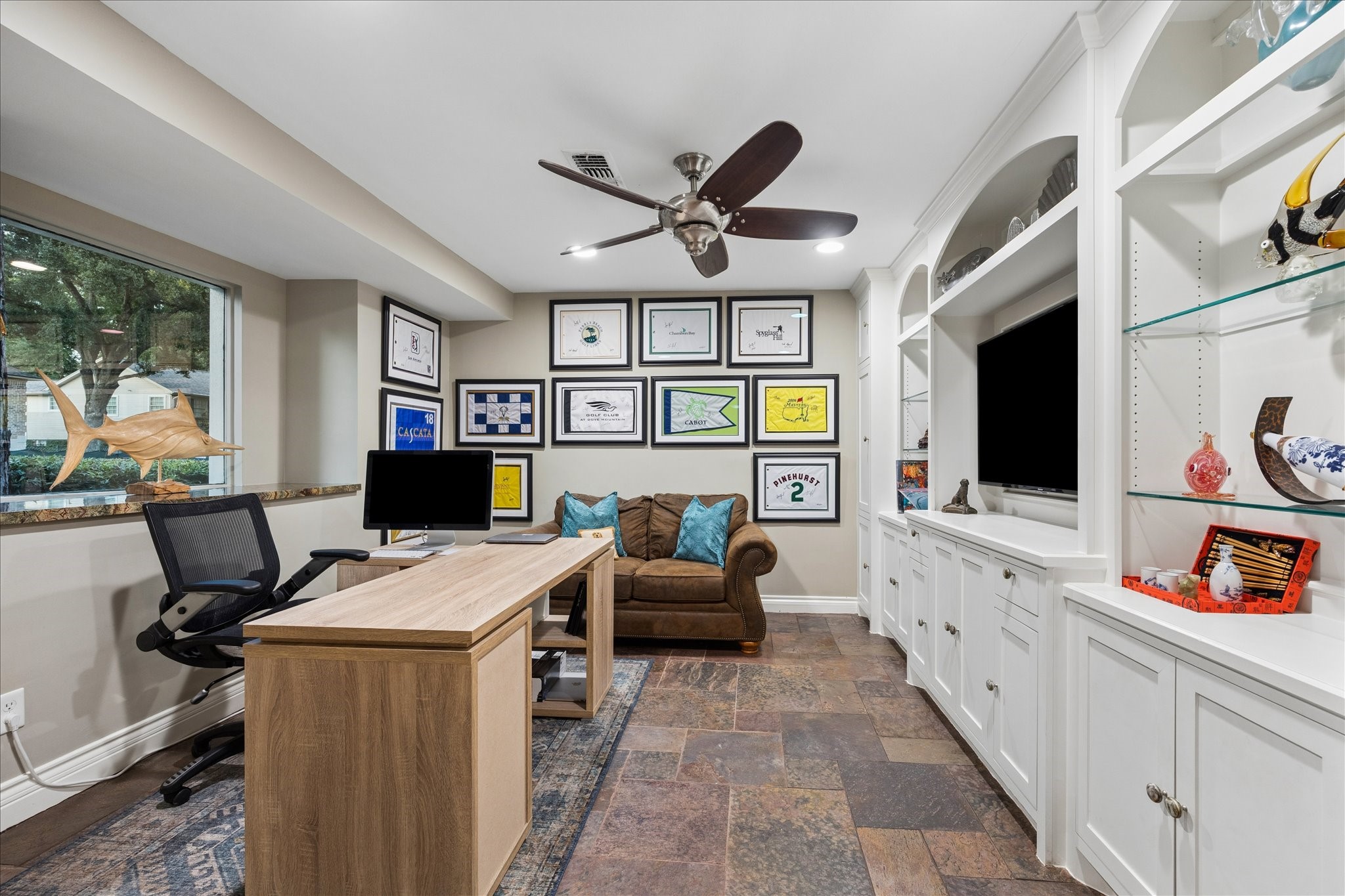 Currently a study but also could be a play room. There is a door for privacy as well.