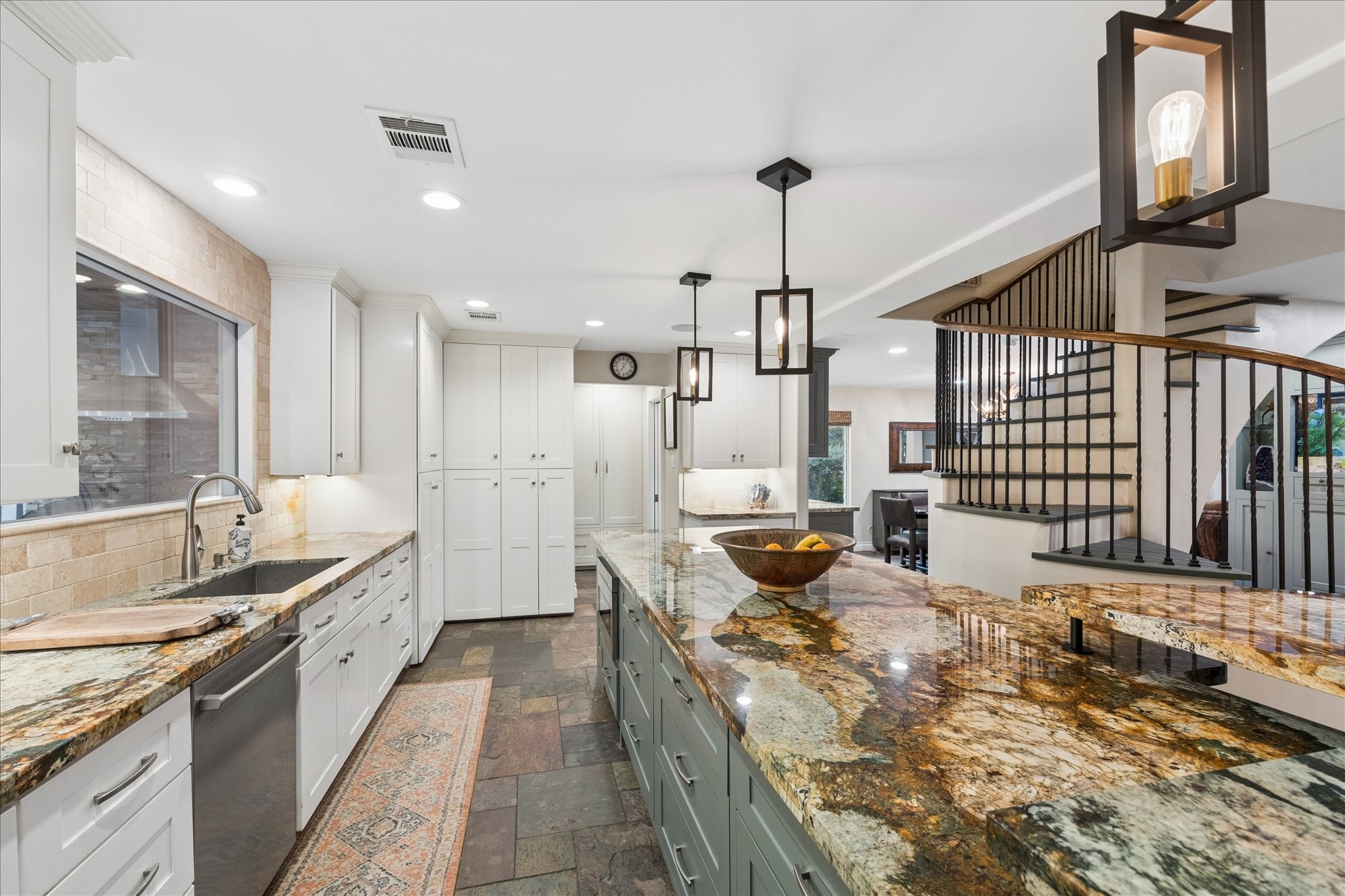 Fabulously expanded kitchen in 2020. Loads of cabinetry, expansive workspace and top of the line appliances.
