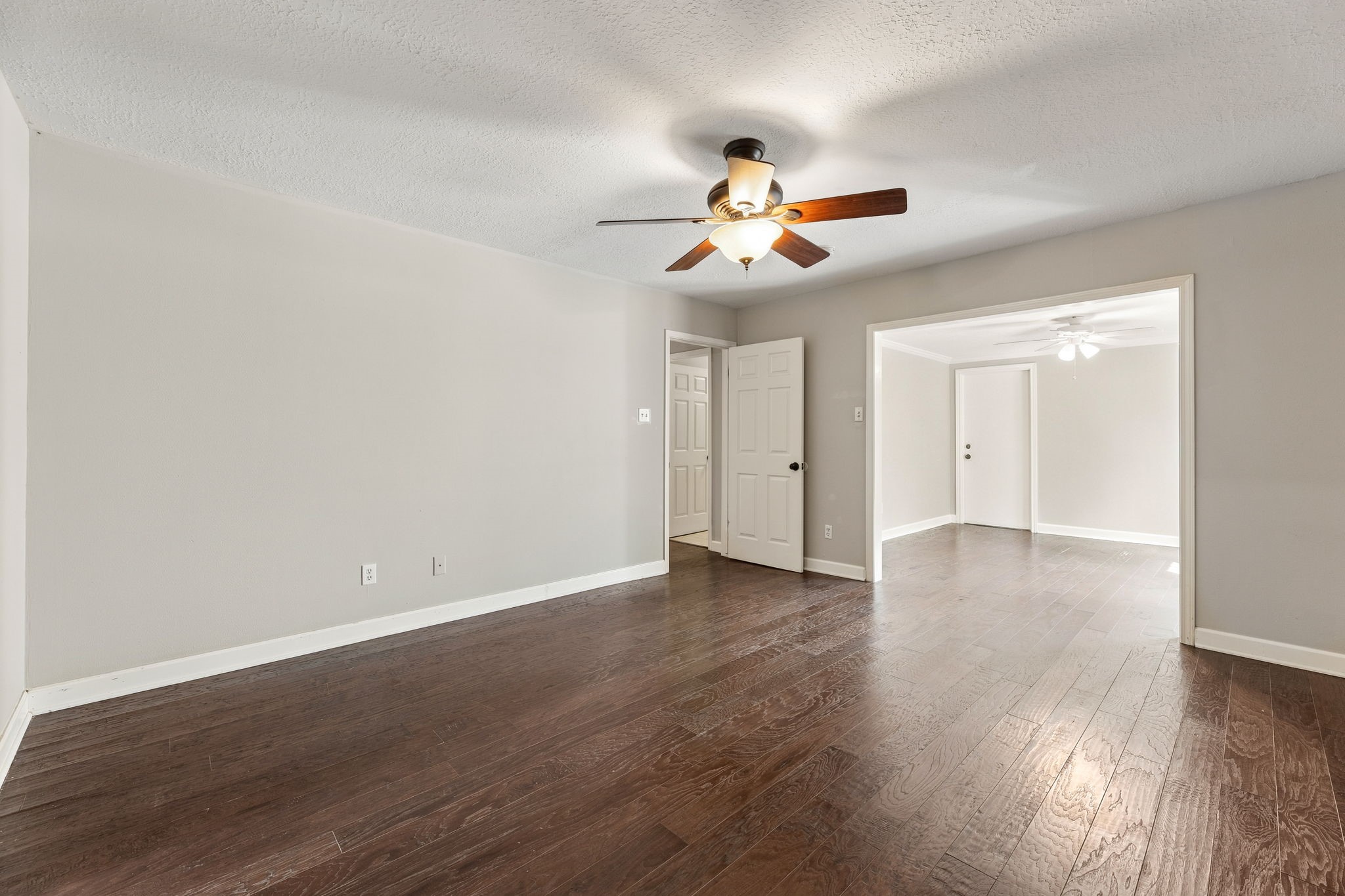 Primary suite flows directly into the adjoining flex space!